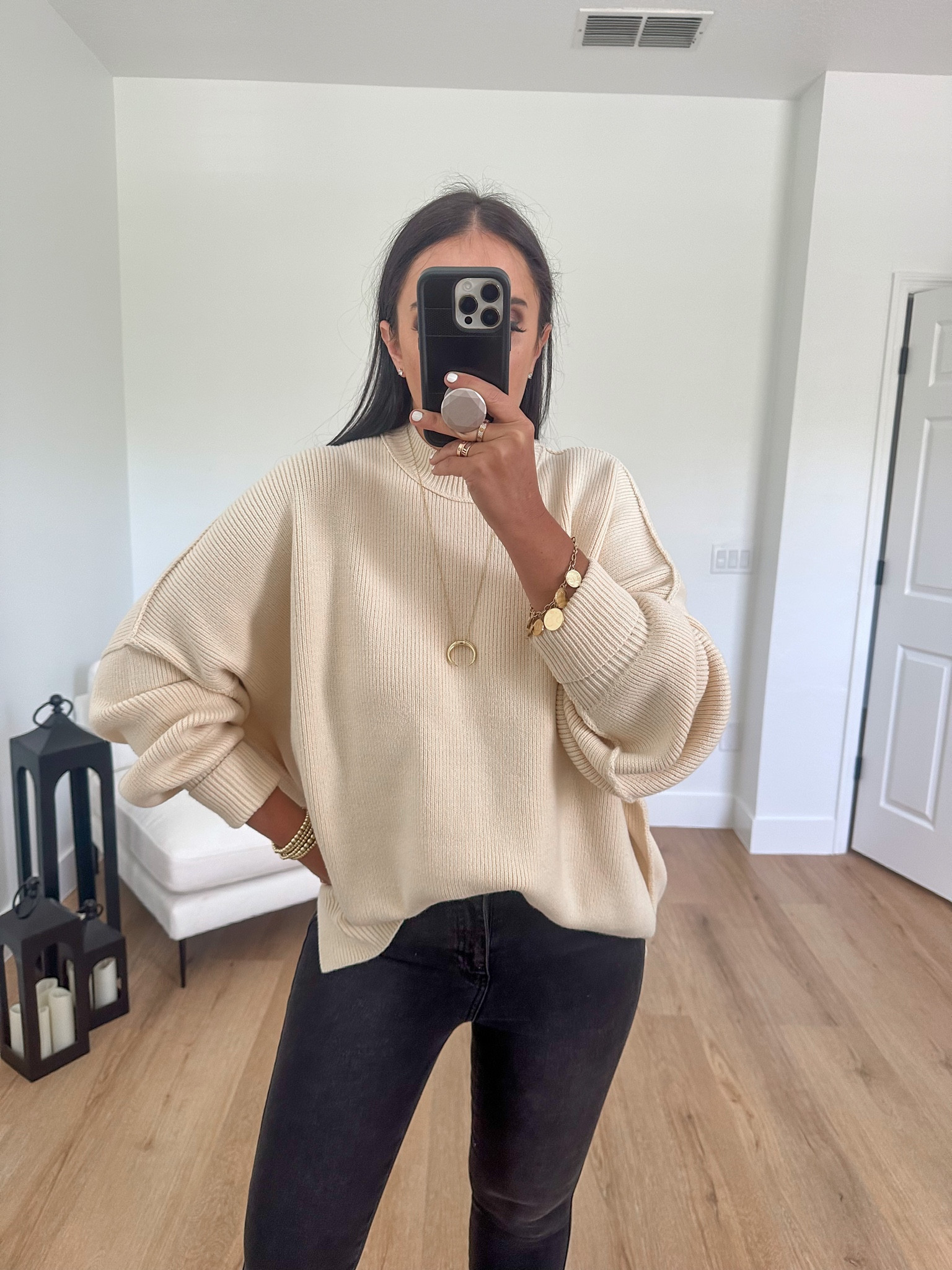 Free People Easy Street Tunic wearing size extra small. We The Free Raw High-Rise Jegging wearing size 28. Marc Fisher LTD Alva ankle Boots