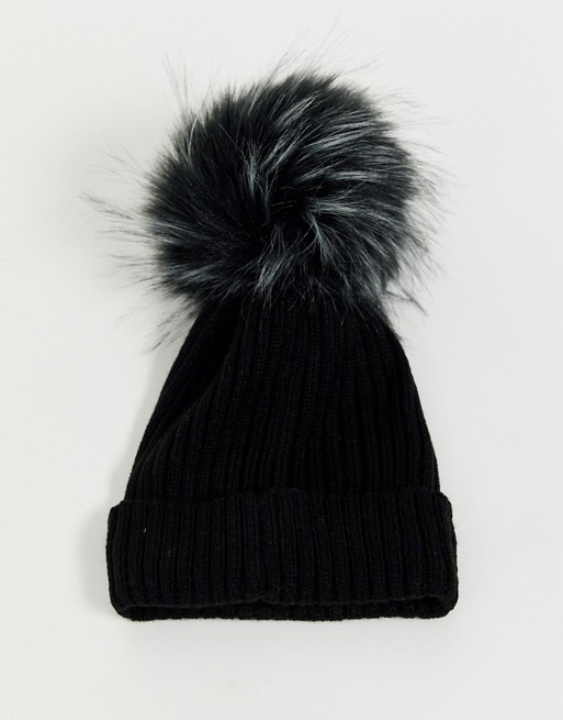 Stitch & Pieces Exclusive black beanie hat with pom | ASOS UK