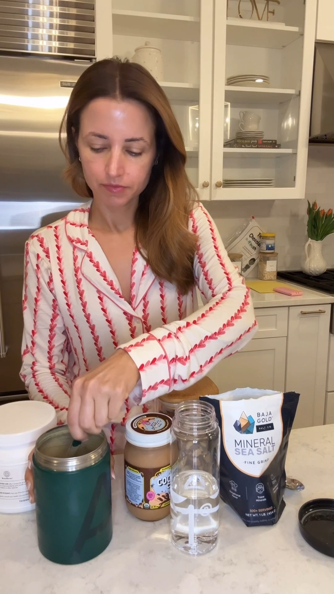 My morning routine - I do this every single morning around 7:30! AG1 is my multivitamin and rich in minerals and vitamins! I add 2 scoops of creatine to it and 5 drops of Vit D because I’m not in the sun as much right now. I do 1-2 teaspoons of iron. Then I take a pinch of mineral salt under my tongue - it’s so good for hydration, question, reducing inflammation and so much more! I follow up with 2 Brazil nuts - great for thyroid function, heart and brain health, heart health and fighting inflammation. I finish with a scoop of coconut cult - this is a live probiotic yogurt that is SO GOOD for gut health! 

#LTKmorningroutine #LTKselfcare #LTKmomlife