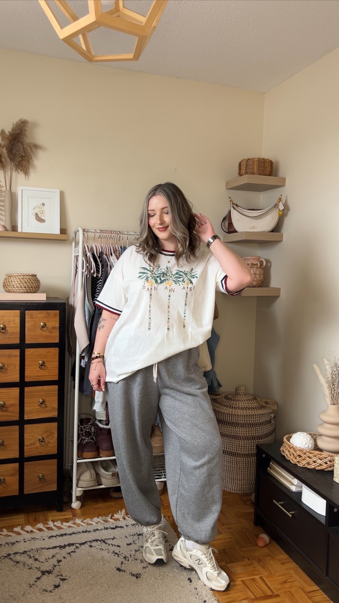 Comfy casual spring outfit on sale! Wearing my usual size L in the palm graphic tee and baggy jogger sweatpants. New Balance sneakers are super comfy but run big, I’m a 9.5-10 and wear a 9.

#LTKsale #LTKmidsize #LTKsummer