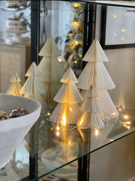 Paper Trees. Follow @farmtotablecreations on Instagram for more inspiration. These beautiful paper trees from Amazon are absolutely beautiful and are trending again this year. Definitely a high sell out risk. I paired these with twinkle lights and they are so beautiful. Paper Trees. Christmas Decor. Holiday Decor. Amazon Home Finds  

#LTKfindsunder50 #LTKHoliday #LTKhome