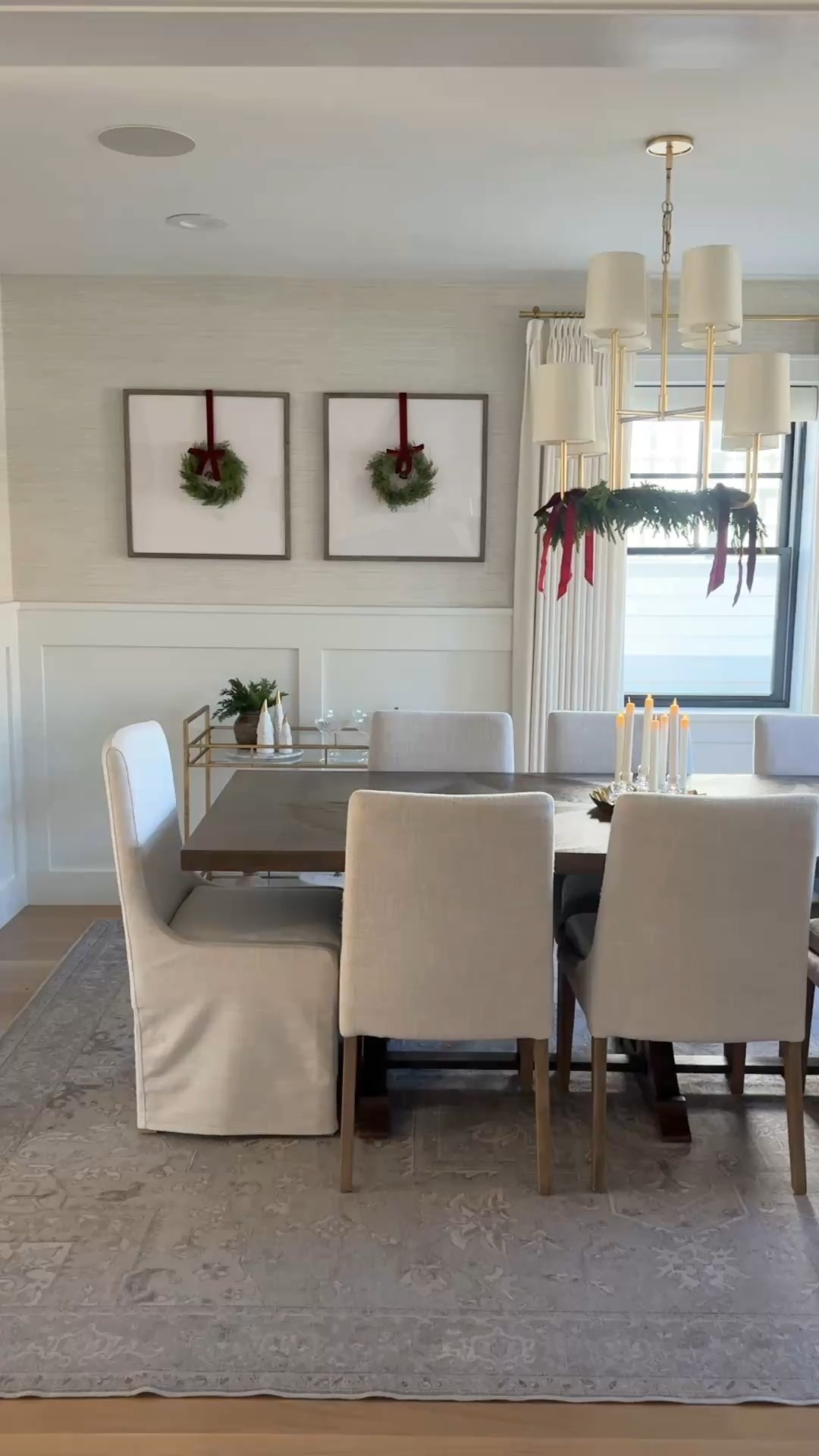 Holiday dining room details 🤍
When I’m hosting, I like to keep the table festive but minimal—leaving plenty of space for food and wine. Simple centerpieces, flameless candles with a soft flicker (and built-in timer), and subtle greenery keep things feeling classic and unfussy. I also love adding holiday touches off the table, like mini wreaths on gallery frames and garland or bows on the chandelier, to create height and interest without clutter.

Everything linked here—mix of exact pieces and look-for-less finds to recreate this holiday-ready dining room.

#LTKSeasonal #LTKHome #LTKHoliday