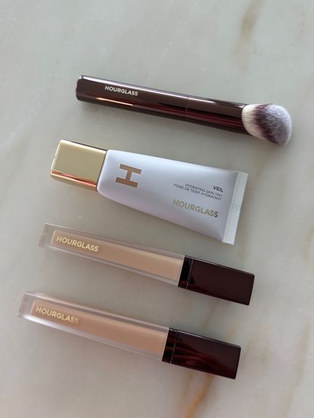 My favorite brush and best selling skin tint and concealer from Hourglass Cosmetics. 

Concealers- beech and sepia 
Tint- shade 7

Makeup lover, beauty must-haves, 

#LTKbeauty