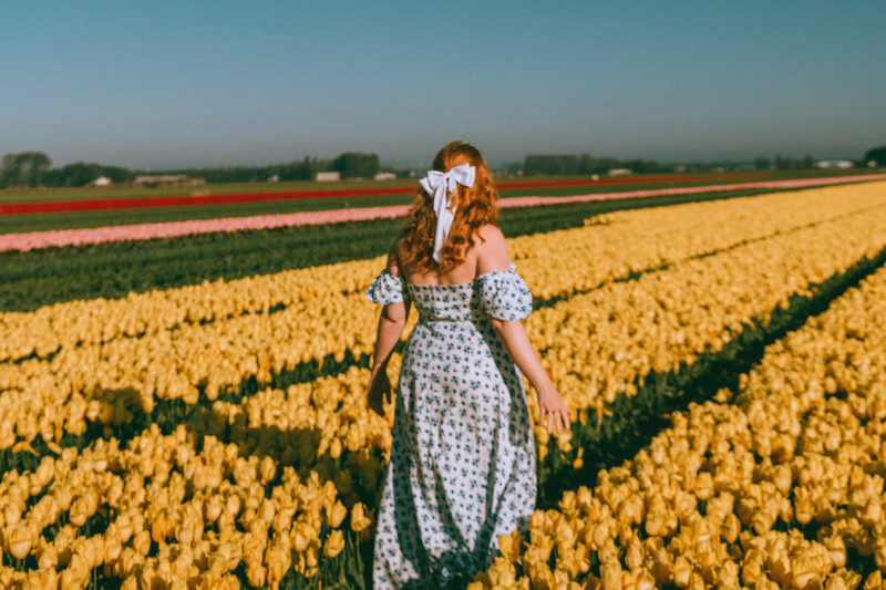 A dreamy day among the Dutch tulip fields in the perfect floral milkmaid dress 🌷✨ #SpringAdventures #TulipFields #RomanticStyle 

 #LTKMidsize #LTKStyleTip #LTKTravel