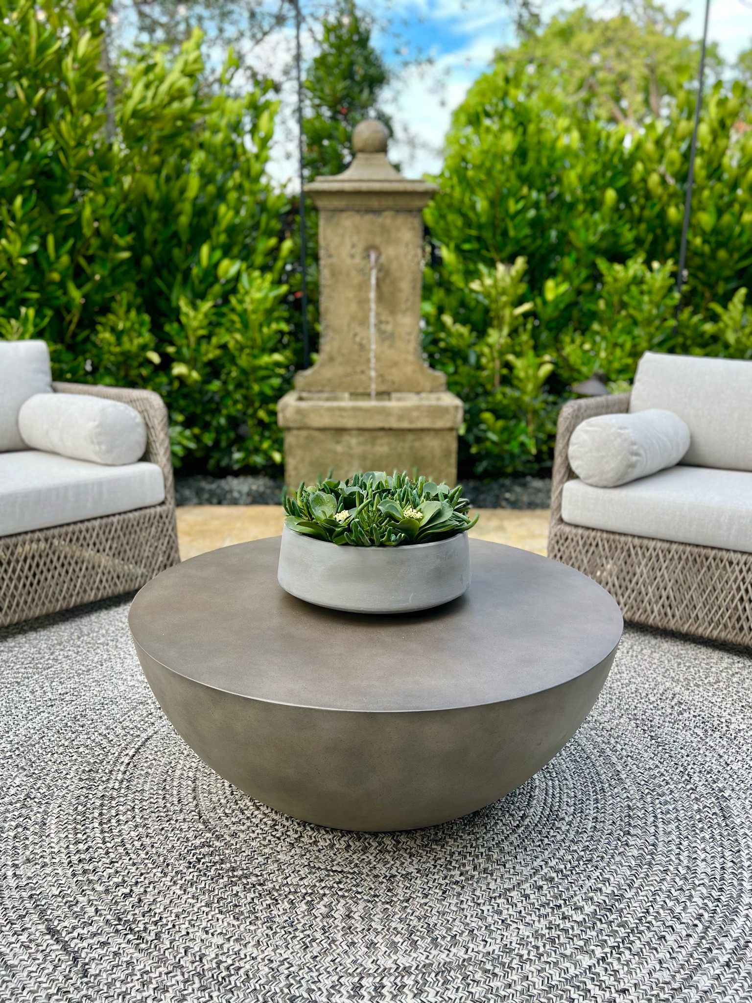 The beauty is often in the simplicity. This outdoor seating area is cozy thanks to the rustic fountain, outdoor rug, cozy outdoor lounge chairs, and not getting too carried away with table decor. Let the natural foliage be the decor! 

#LTKfamily #LTKSale #LTKhome