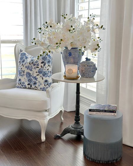 Blue fringe ottoman $60 , spring decor, blue and white decor, ginger jar 

#LTKunder50 #LTKstyletip #LTKhome