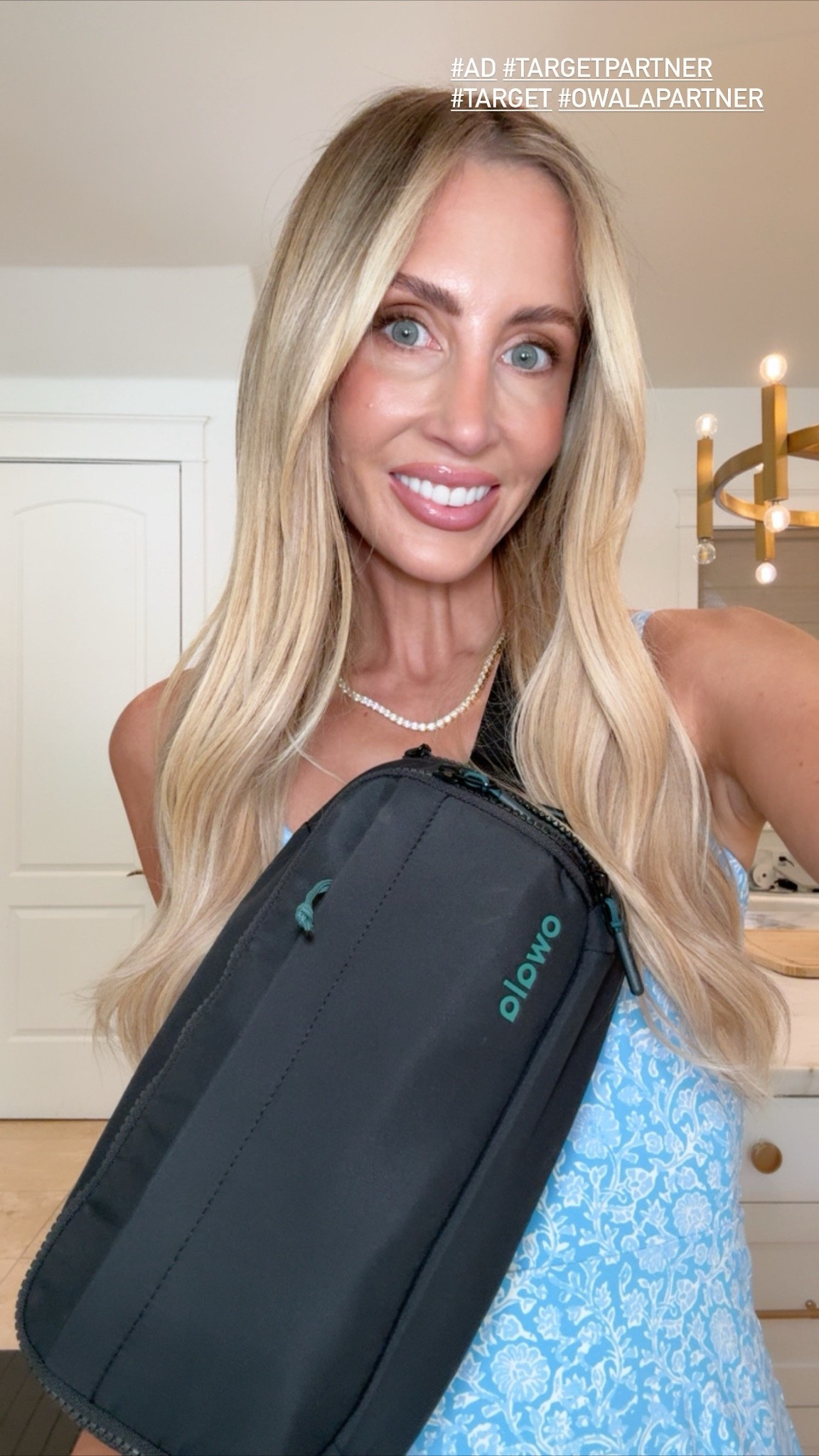 #Ad My favorite mom hack! If you're an Owala girl, this crossbody is a must-have. It's the easiest way to carry your water bottle without having to hold it, and I honestly use mine every single day.  @Target @Owala #TargetPartner #Target #OwalaPartner