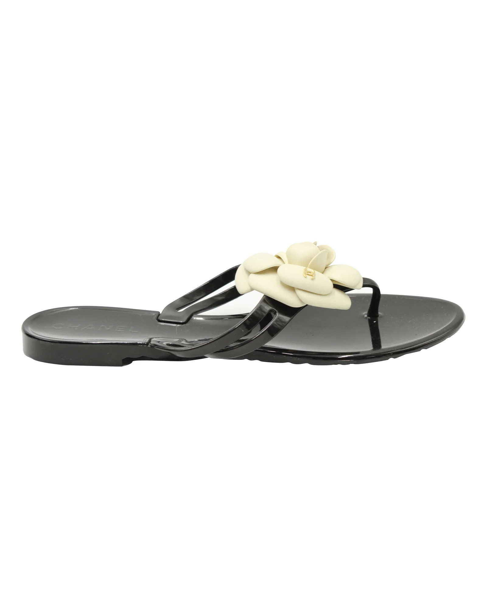 Chanel Camelia Thong Slides in Black Jelly PVC | Shop Simon