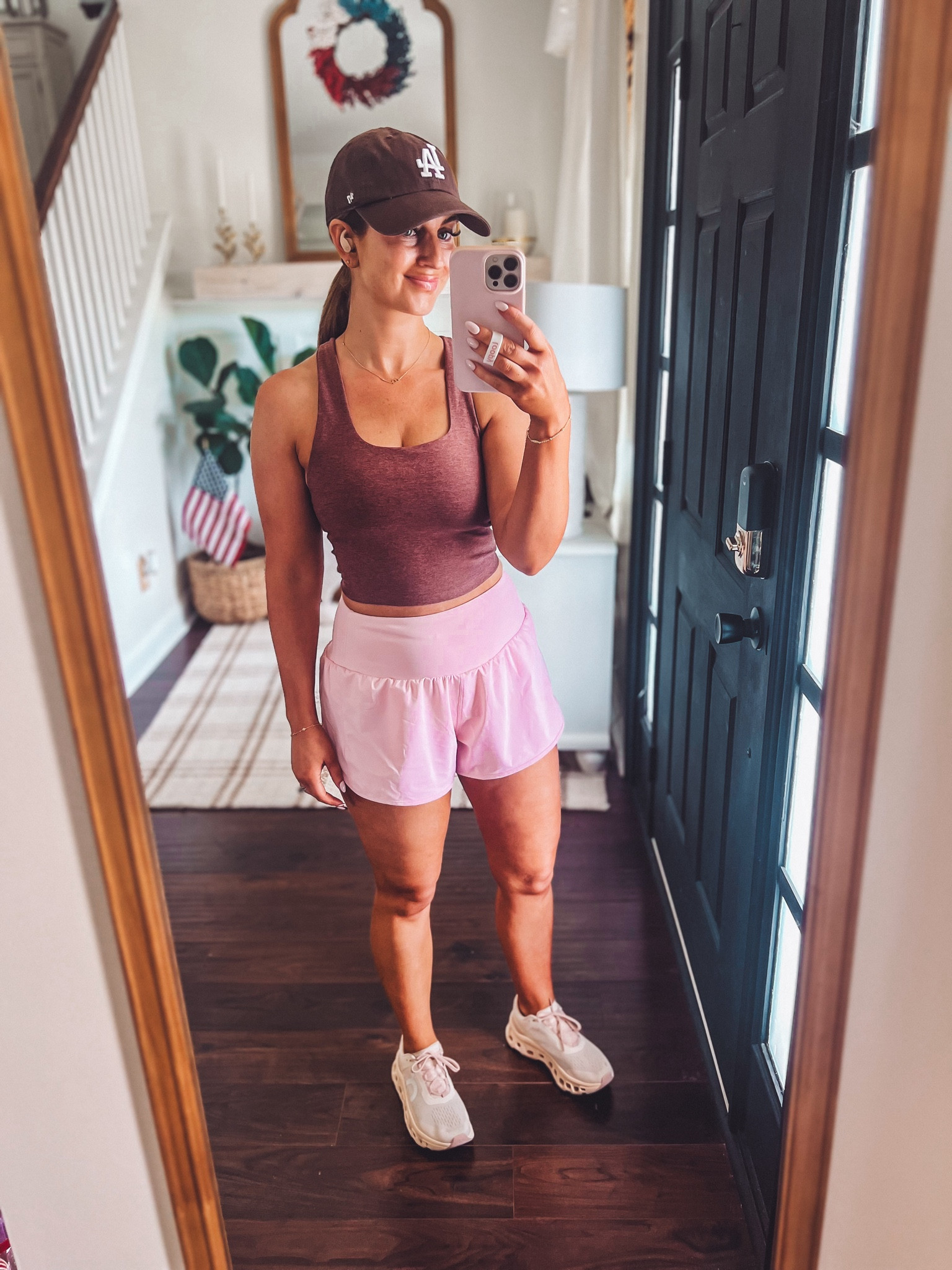 Mocha brown workout top-small 
Light pink workout running shorts-medium 
On cloud monster running shoes-TTS 
Brown LA ball cap 