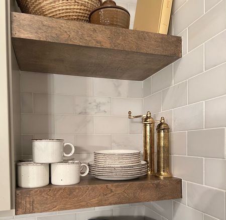 Give me all the vintage vibes in this kitchen shelf styling! Those brass salt and pepper mills are used daily and I love the patina they have now. I linked a similar speckled reactive glazed dinnerware set for you at an affordable price. (Mine are vintage) 

#LTKstyletip #LTKhome #LTKfindsunder100