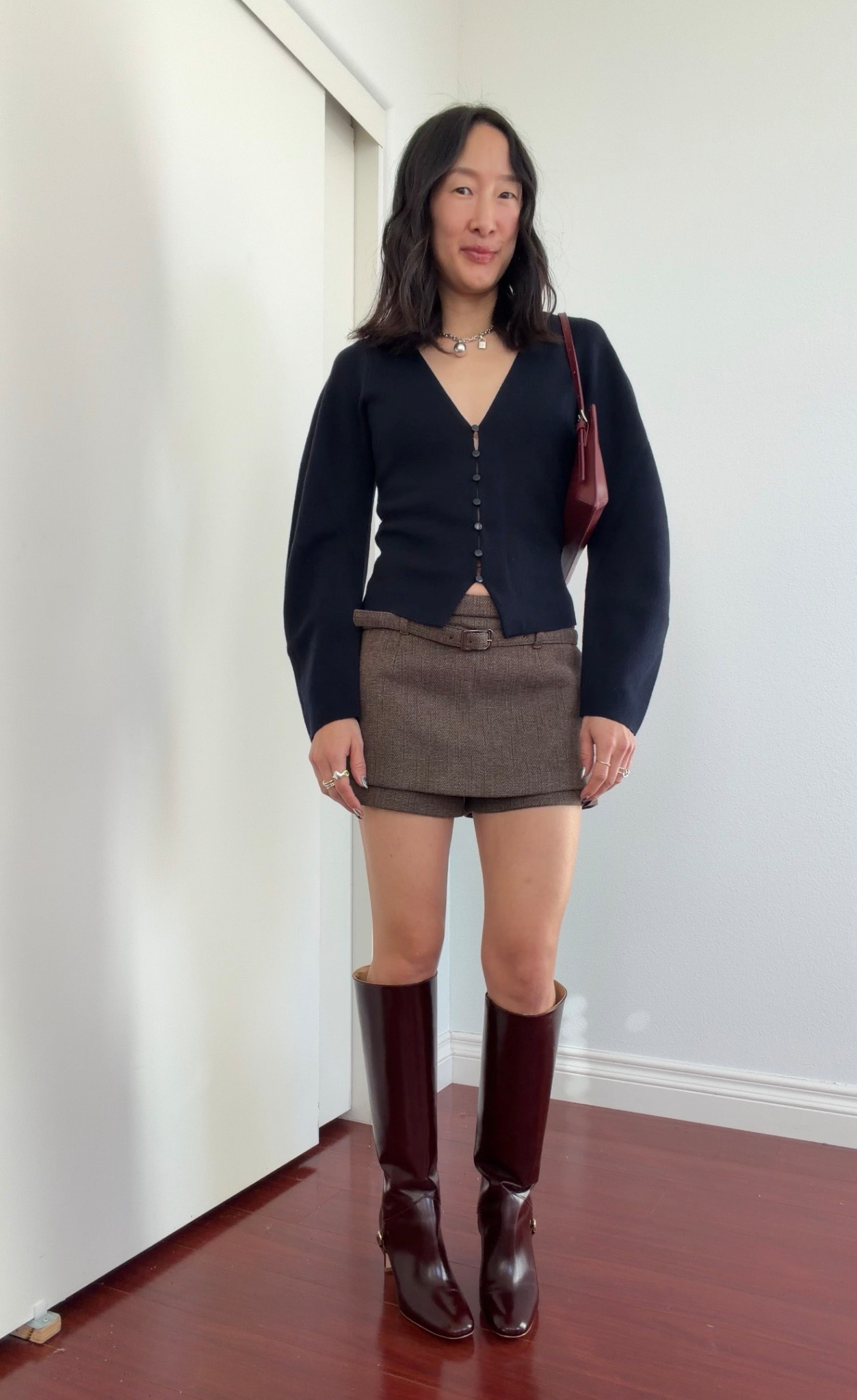 Xs in skort, xxs in cardigan 