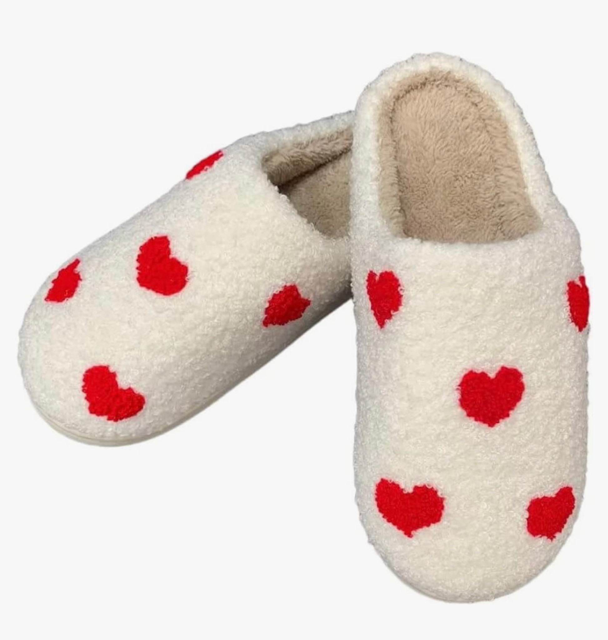 Heart slippers 

#LTKSeasonal #LTKMostLoved