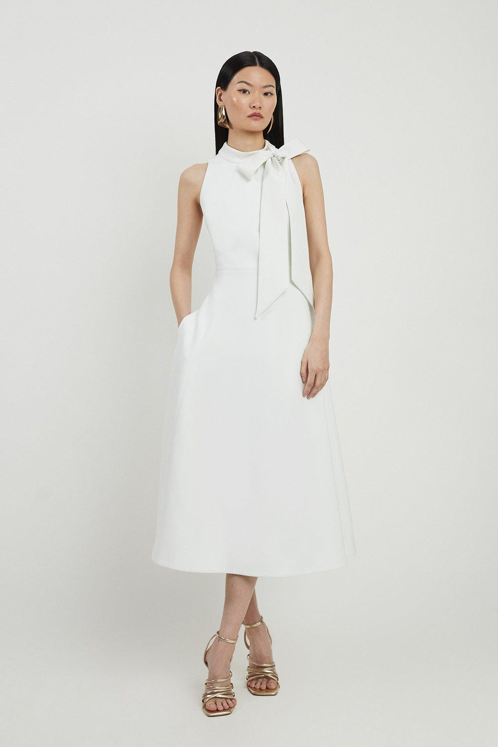 Petite Compact Stretch Bow Tie Neck Full Skirted Midi Dress | Karen Millen UK + IE + DE + NL