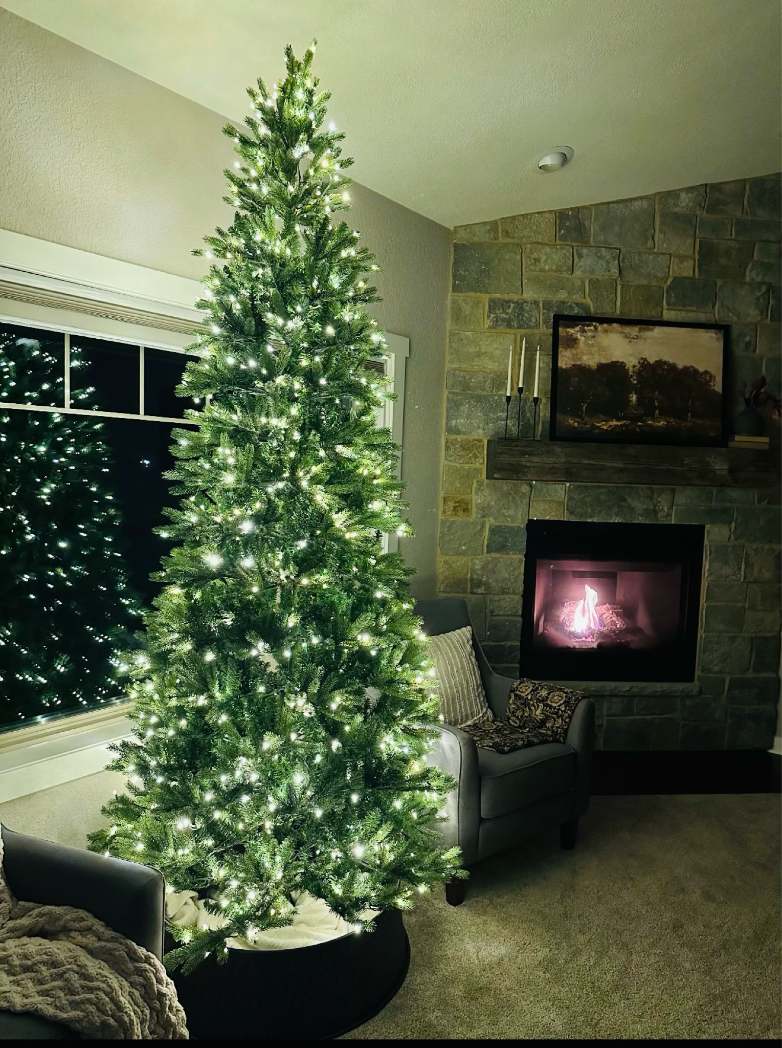 Oh all lit and waiting to decorate! This 9ft King of Christmas tree is gorgeous! King Slim LED Fraser Fir! Remote access with multiple light options. Storage bag and gloves for fluffing included.

#LTKHoliday #LTKhome #LTKSeasonal