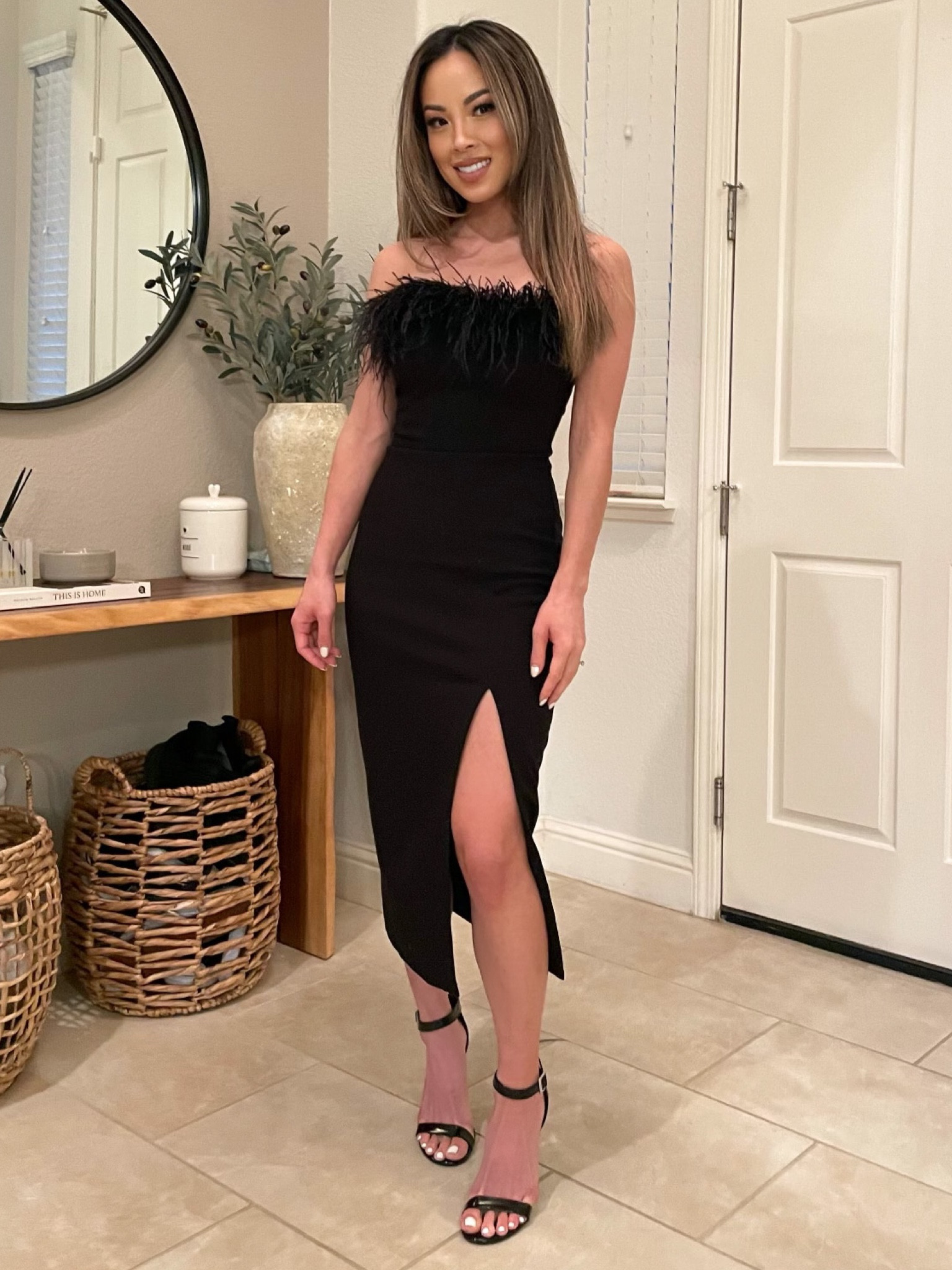 Perfect dress for a fancy dinner, cocktail, wedding, or the holidays! I am wearing a size zero. 
Feather dress, likely midi desi dress, black dress

#LTKstyletip #LTKFind #LTKwedding