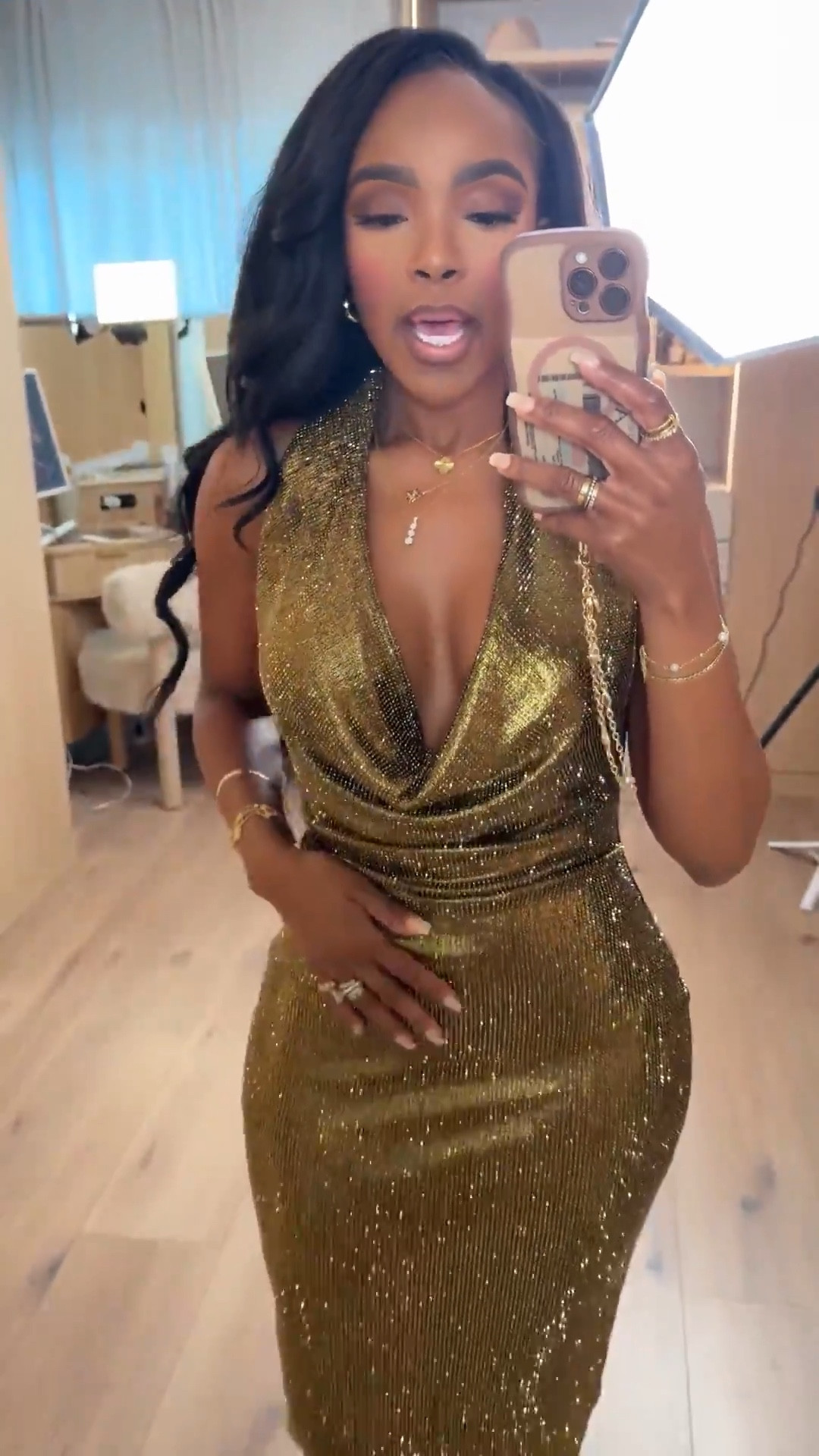 A show-stopping gold moment — this metallic dress drapes beautifully with a plunging cowl neckline and a sculpted silhouette that hugs every curve. The shimmer catches the light with every step, making it the ultimate statement piece for glam nights.

Perfect for holiday parties, New Year’s celebrations, and any event where you want to walk in glowing.

📏 Sizing: dress (small)  
Height 5'4" · 138 lbs · 34D bust · 27" waist · 40" hips

gold metallic dress, holiday party outfit, New Year’s Eve look, glamorous evening dress, curve-hugging event style, sparkly statement dress

Favorite to revisit later.

Follow me on Instagram and YouTube @kirasfashionfinds

#LTKGiftGuide #LTKootd #LTKgrwm