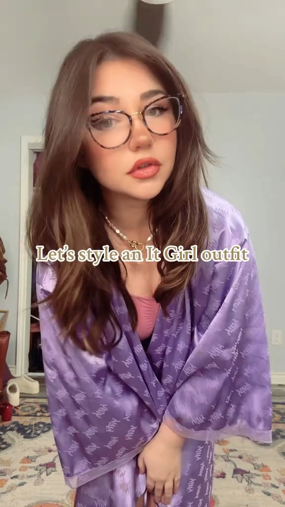 It girl outfit with black vest, red Mary Jane ballet flats, cropped flare jeans 

#LTKfindsunder100 #LTKstyletip #LTKfindsunder50