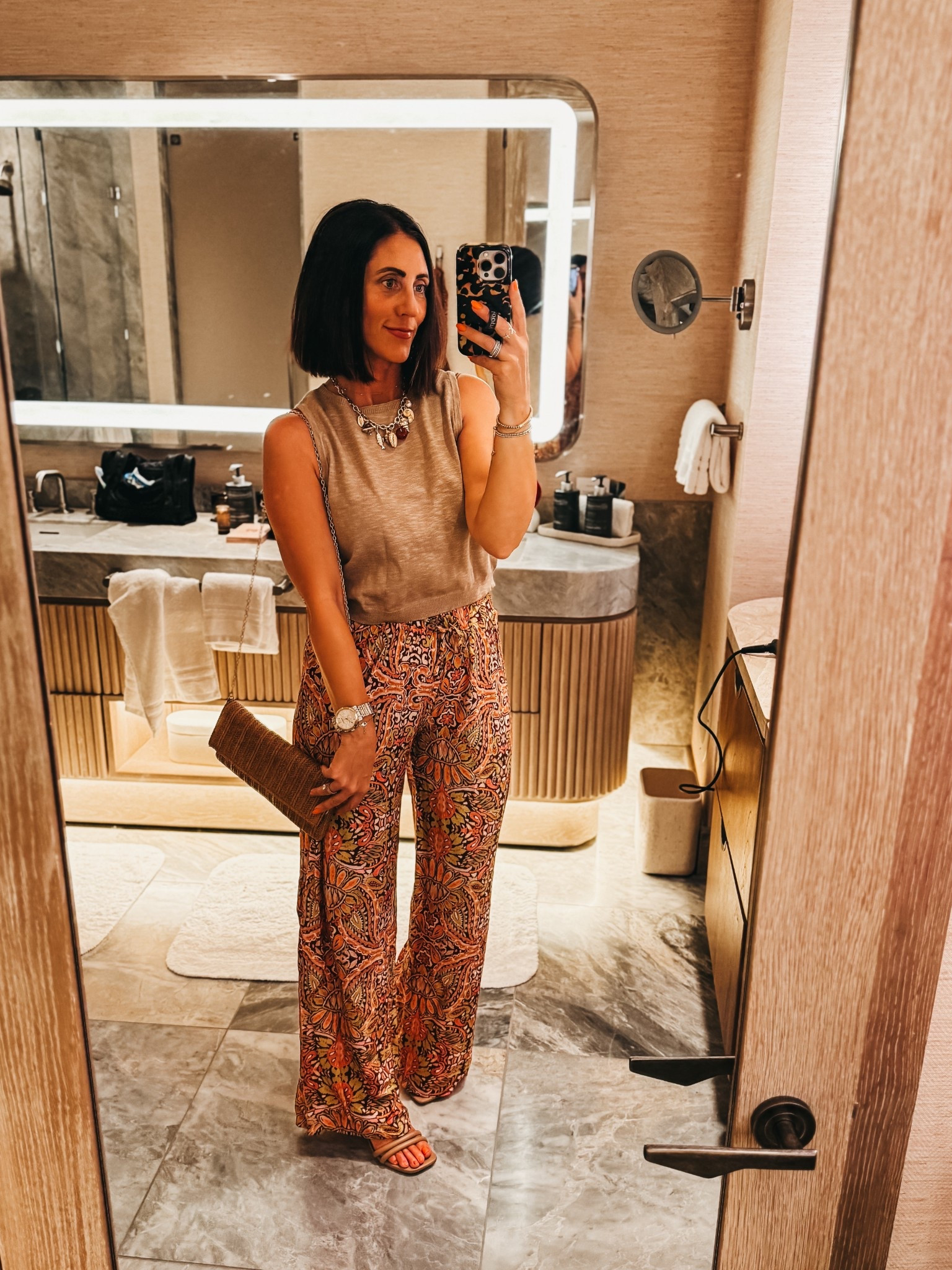 Vacation dinner outfit! These wide leg patterned pants are so fun and I’ve worn them as cover-up pants with my swimsuit!! 

Tank - size small 
Pants - size small 

Use my exclusive discount code: THISISOURBLISS35 for 35% off your order

#vici #vacationstyle #SpringBreakOutfit #VacationOutfitIdea #vicihaul  ￼￼

#LTKTravel #LTKootd #LTKOver40