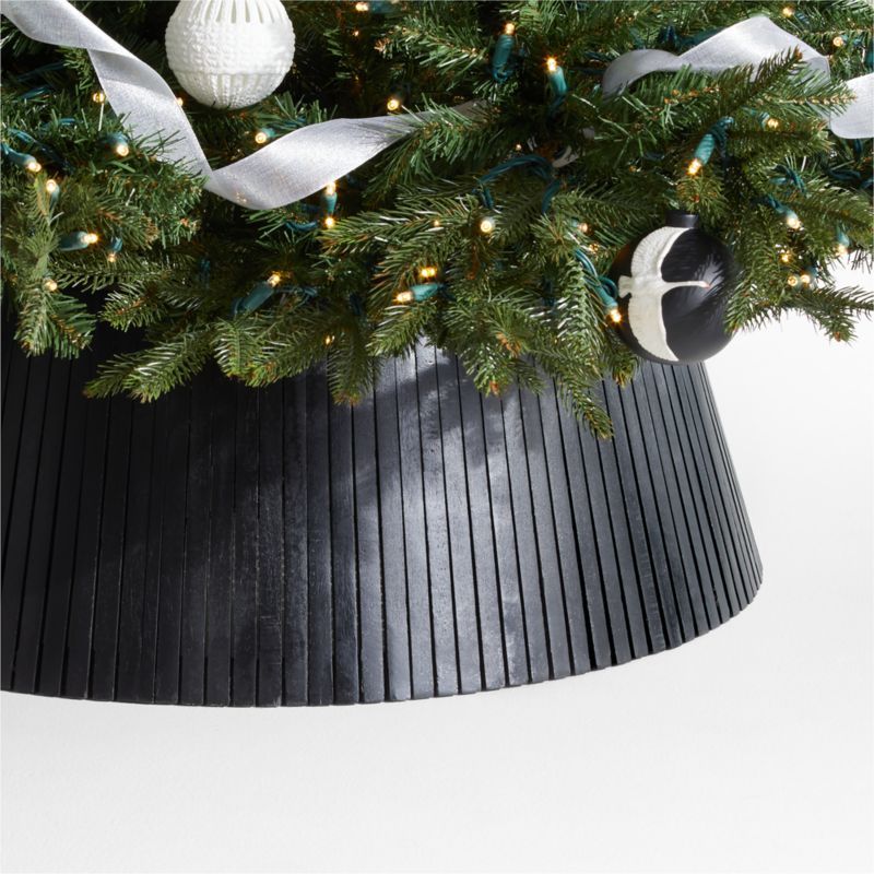 Skei Black Wood Christmas Tree Collar | Crate and Barrel | Crate & Barrel