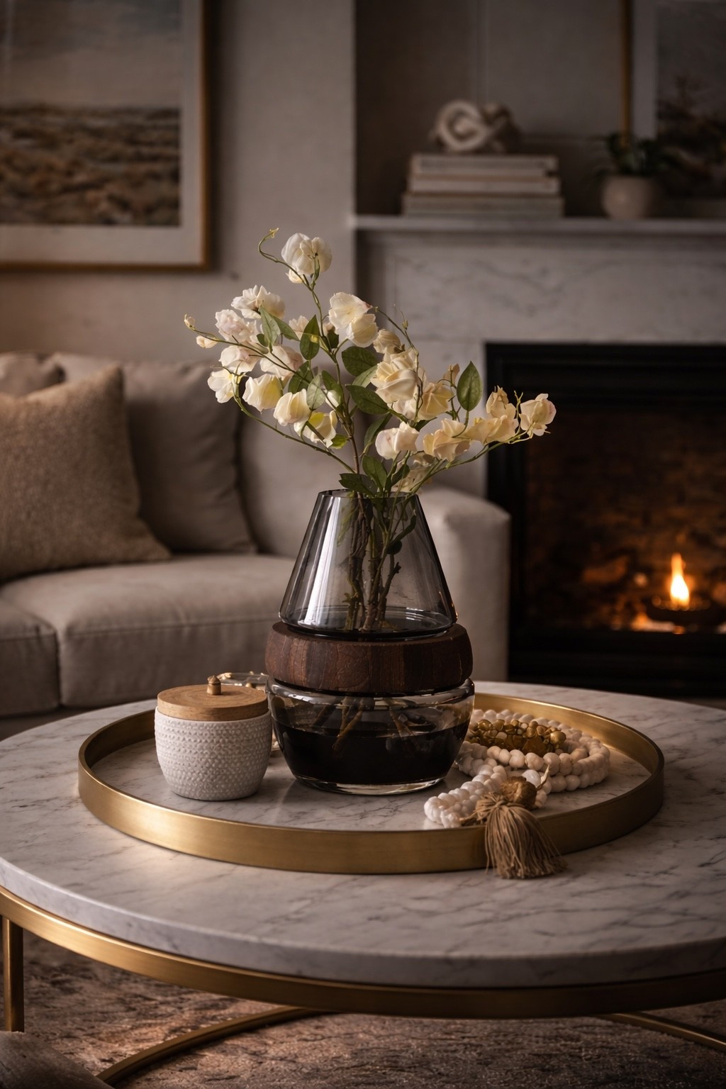 Soft, moody coffee table styling 🤎
Glass + wood vase paired with neutral stems for an elevated cozy look.

Perfect for coffee tables, entryways, or fireplace mantels.

#ltkhome #coffeetabledecor #neutraldecor #modernhome #springhome #homefinds #homestyling #moodyinteriors

#LTKU #LTKHome #LTKdayinmylife