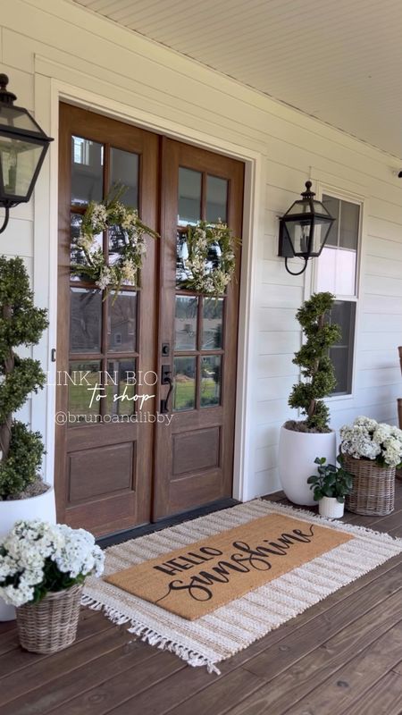 Spring front porch front door home decor and accents wreaths lantern wall sconce lighting light fixtures spiral boxwood faux artificial topiaries large oversized white planters basket planters faux geraniums white hydrangeas double layered welcome doormat and jute scatter rug hello sunshine Etsy nearly natural pottery barn target overstock Amazon 

#LTKhome #LTKFind #LTKSeasonal