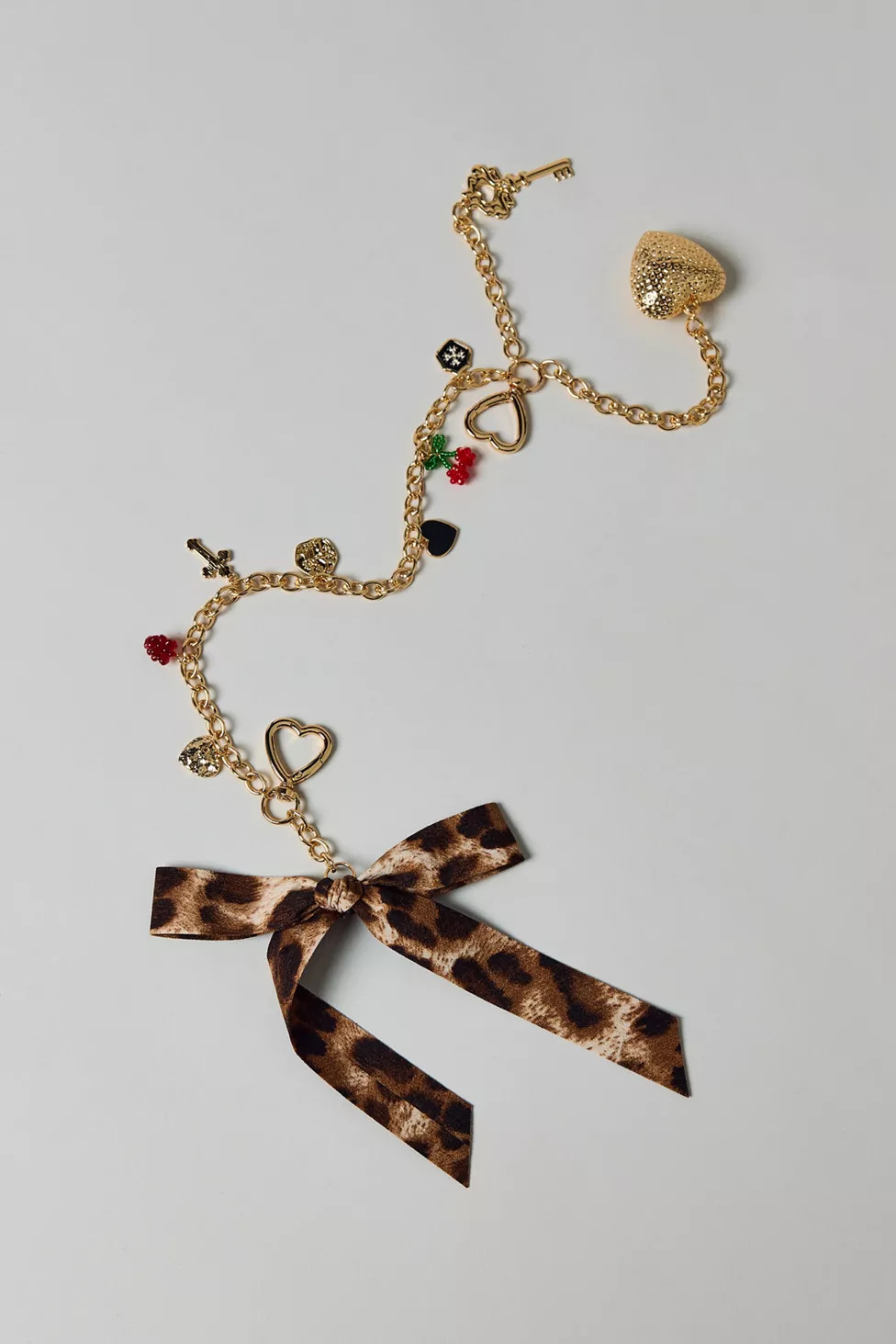 Charmed Bow Charm Bag Chain | Urban Outfitters (US and RoW)