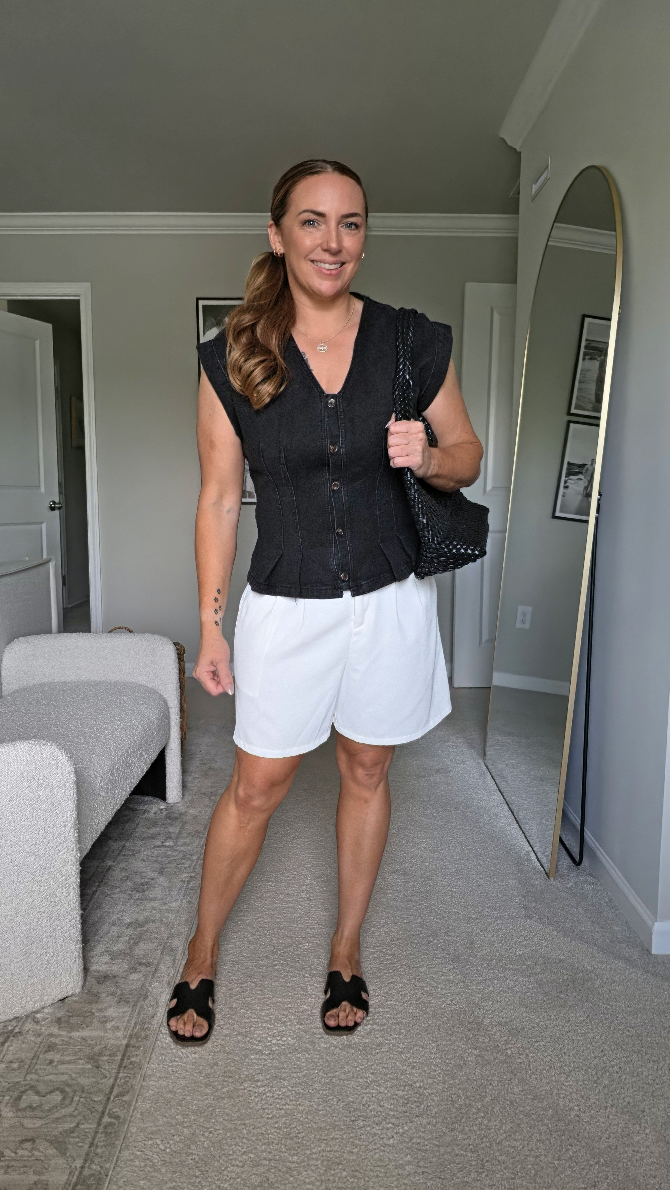This adorable denim vest from Cicy Belle features functional buttons and a fun ruffled hem on the bottom. I paired it with my favorite Amazon dressy shorts, a woven bag, and Target sandals for a chic summer look.#CicyBelle #SummerStyle #DenimVest #CasualOutfit

#LTKgrwm #LTKootd #LTKOver40