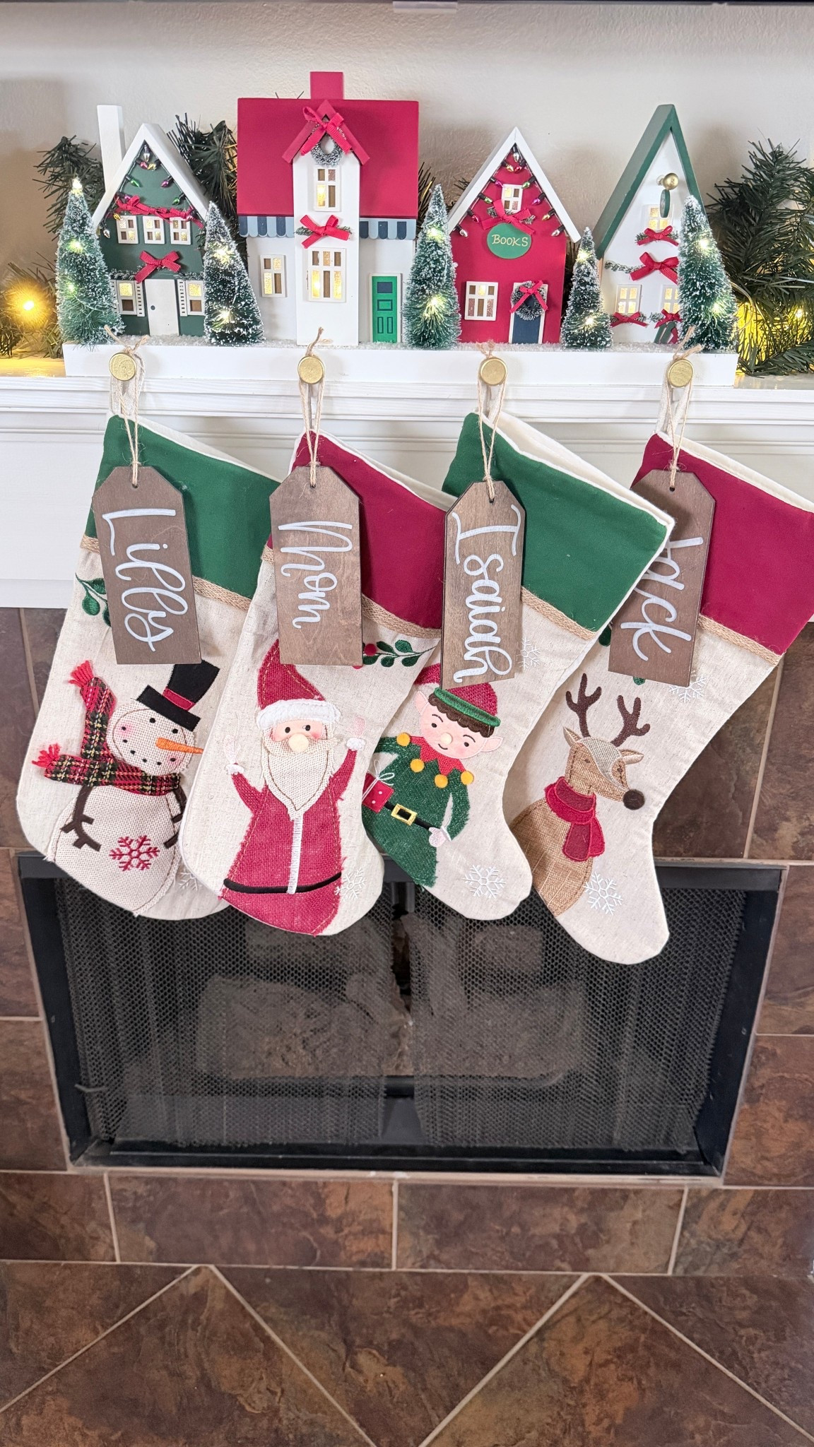 🎄✨Our stockings are officially hung and it’s giving cozy Christmas village magic!
I love how these classic stockings look with our little holiday houses, simple, sweet, and perfectly us. ❤️💚 #manteldecor

#LTKHoliday #LTKHome #LTKSeasonal
