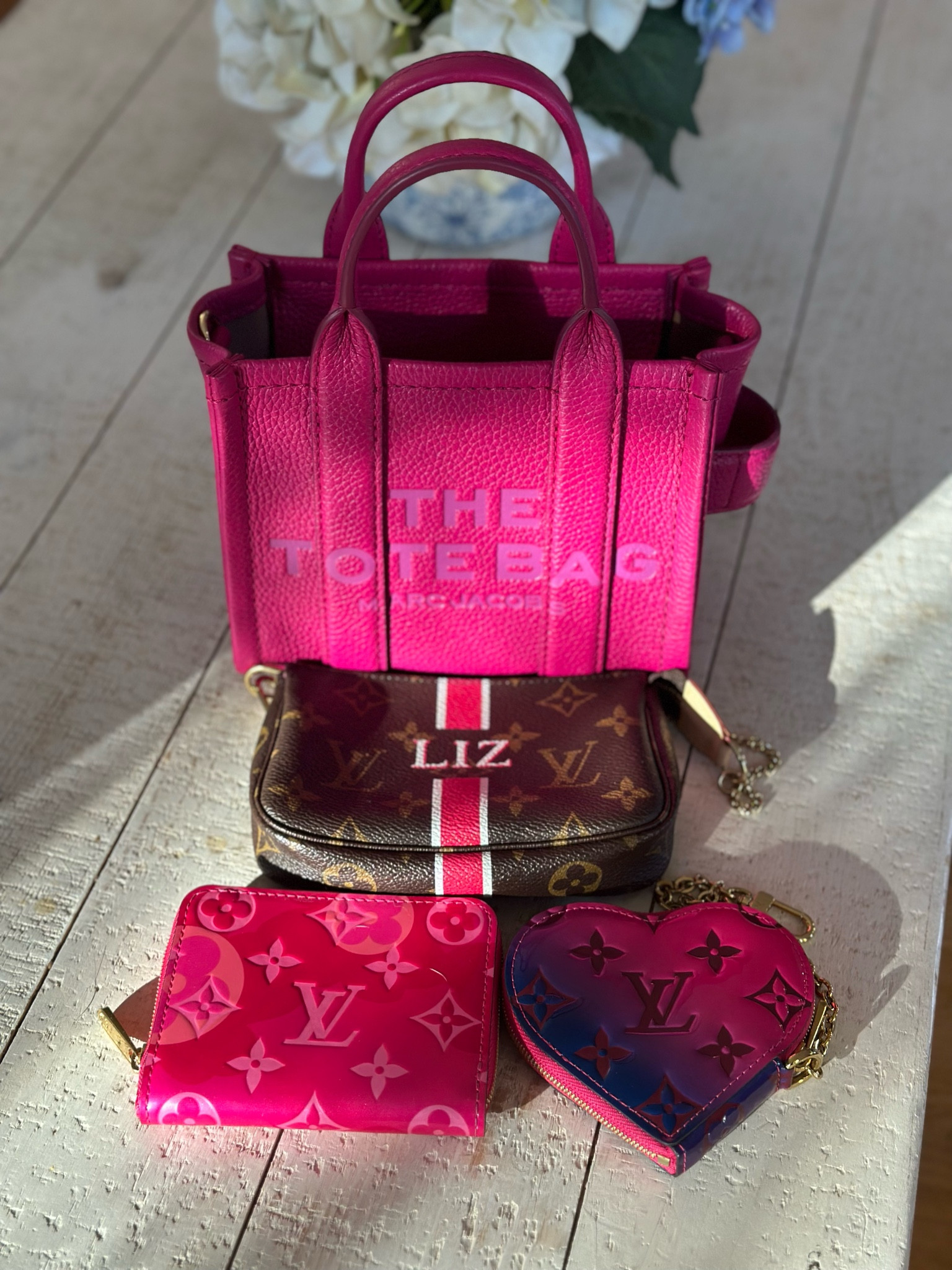 Happy Pink Wednesday featuring my Marc Jacobs Mini Tote in Lipstick Pink and some LV Slgs. 

#LTKstyletip #LTKitbag #LTKGiftGuide