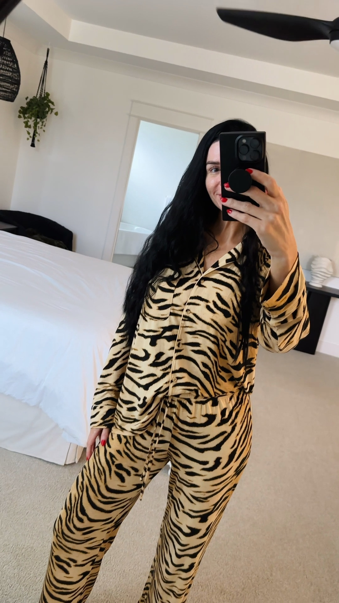 Wow 🐅🖤 I want to stay in these pajamas ALL day long. They are such nice quality, so comfy, breathable & cooling due to modal fabrication🙌🏼✨🐅

In a medium. Generous length in sleeves & inseam ✨ Love them so much, I bought 2 pairs of the same print 

SKIMS LONG SLEEVE BUTTON UP PAJAMA SET | BRONZE TIGER PRINT

#LTKTravel #LTKFallSale #LTKTall