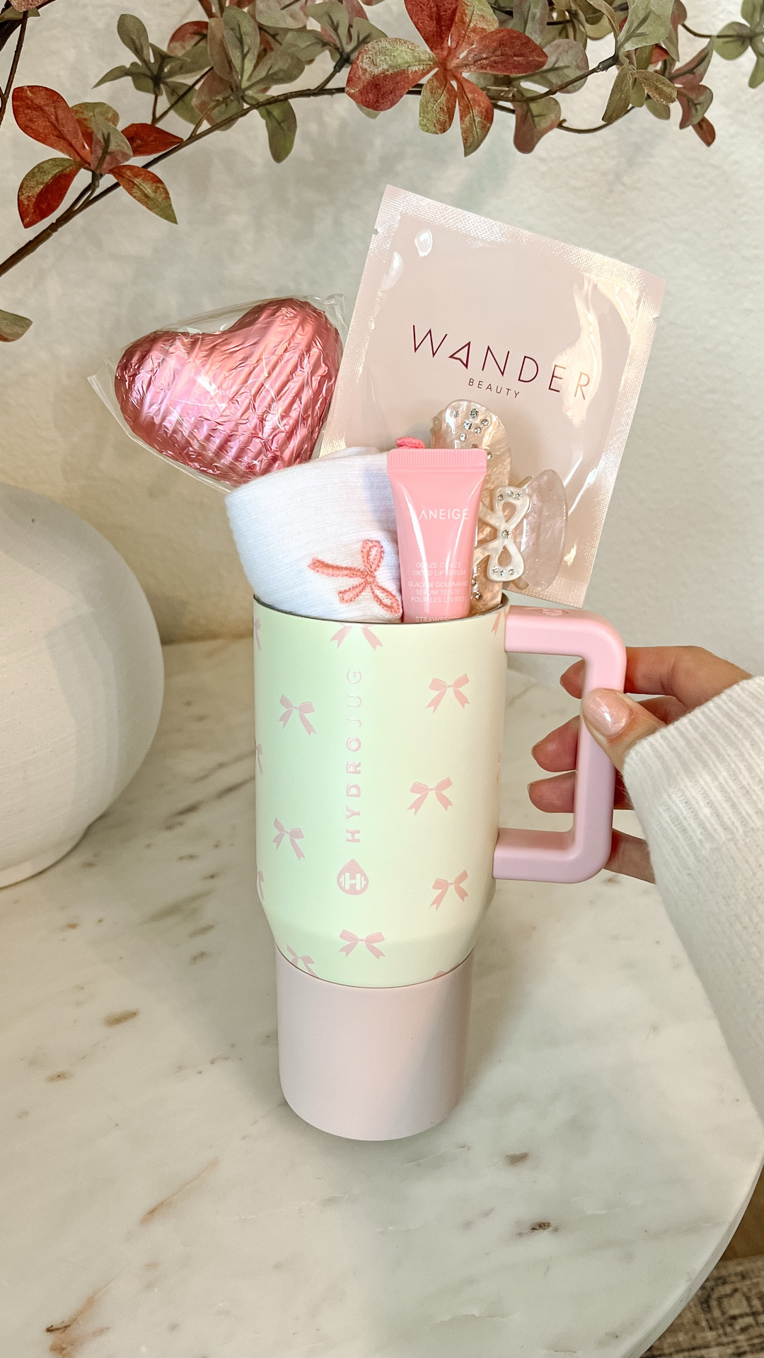 My favorite Valentine’s gift lately: something that actually gets used 💕 I filled a HydroJug with a few fun things — bow socks, a face mask, bow hair clip, Laneige lip gloss, and a little chocolate — to make a Valentine that feels cute but still practical.

Perfect for tweens, teens, besties, galentine, teachers… or honestly, yourself.

#valentinesgiftideas #valentinesdaygift #galentine
#amazonfinds #momcreator

#LTKSeasonal #LTKmomlife #LTKFindsUnder100