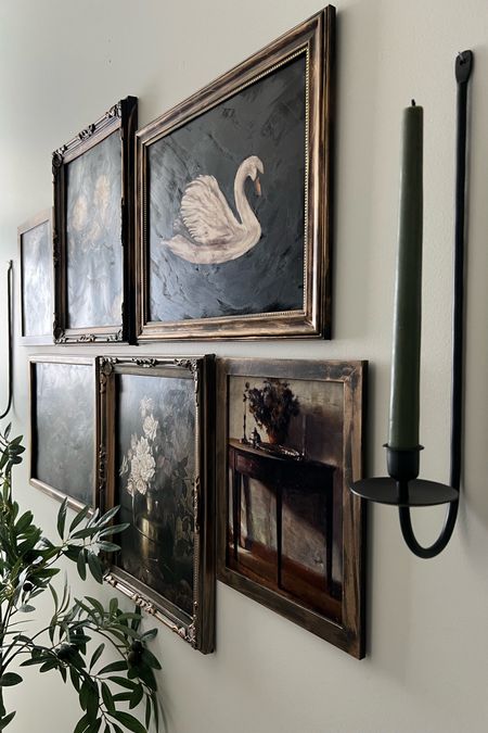 Gallery wall with slim iron candle  sconces. Digital download prints from Etsy and budget friendly sconces made this very affordable! 
All my frames are inexpensive. I paint them black and use gold rub n buff to get an antiqued look!
Moody gallery wall, luxe for less 

#LTKFindsUnder50 #LTKHome