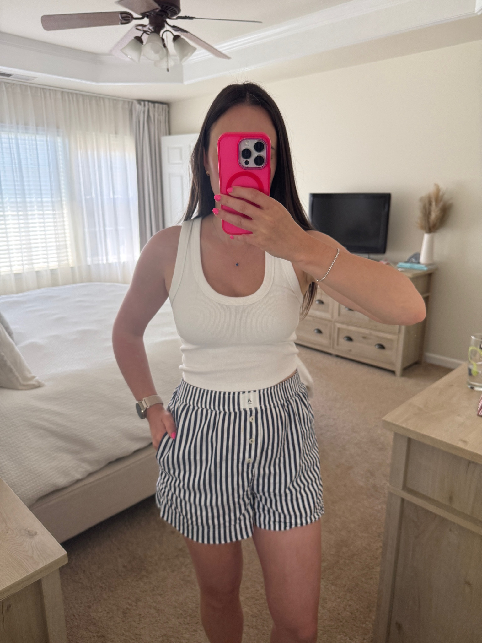 Work from home outfit 
Anthropologie wren boxer shorts
Abercrombie basic tank

#LTKMothersDay #LTKootd #LTKmomlife
