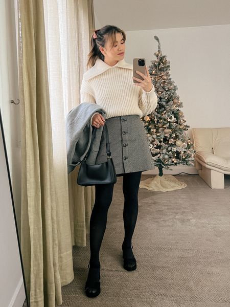 Cream polo sweater layered under a long grey double-breasted coat and Madewell button-front skirt and black heels!

Top: XXS/XS
Bottoms: 00/0
Shoes: 6

#winter
#winteroutfits
#winterfashion
#winterstyle
#holiday
#giftsforher
#abercrombie
#freepeople 
#madewell


#LTKHoliday #LTKSeasonal #LTKstyletip