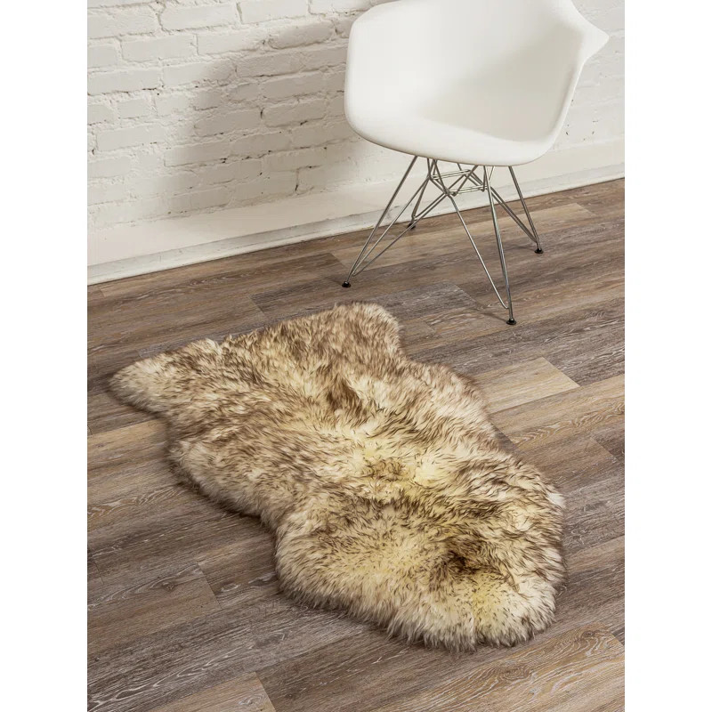 Juri Handmade Sheepskin Brown Area Rug | Wayfair North America