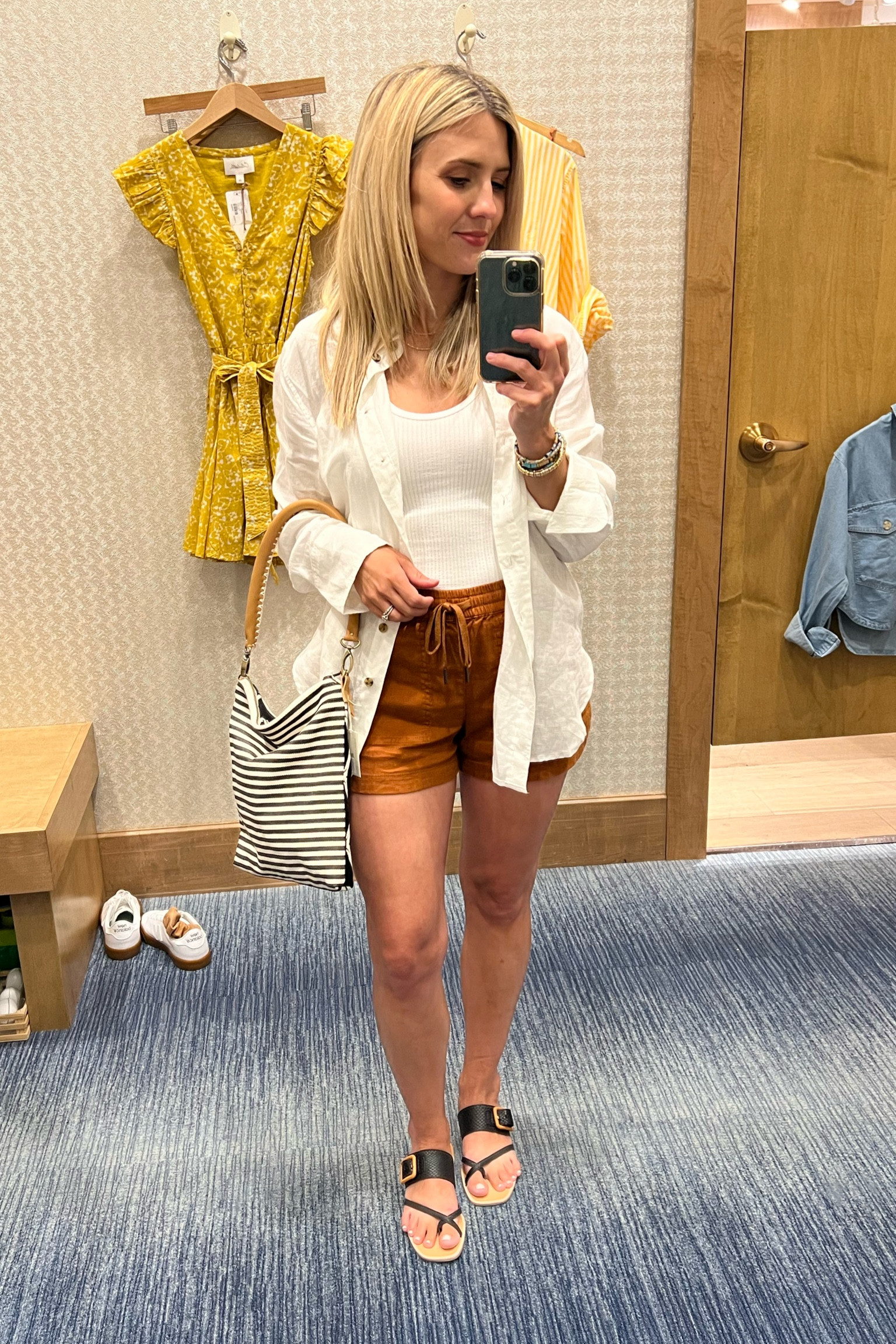 Love this breezy linen-forward style. Organic linen button-down and linen shorts, super comfy tank, handmade bag, comfy slides. The shirt is great for creating some privacy while nursing as well. Perfect look for traveling or going to the beach. 

#LTKtravel #LTKstyletip #LTKitbag