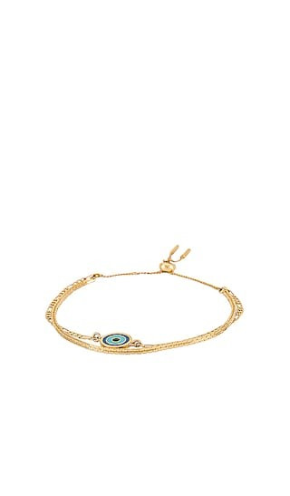 Jenny Bird Evil Eye Bracelet in Metallic Gold. | Revolve Clothing (Global)