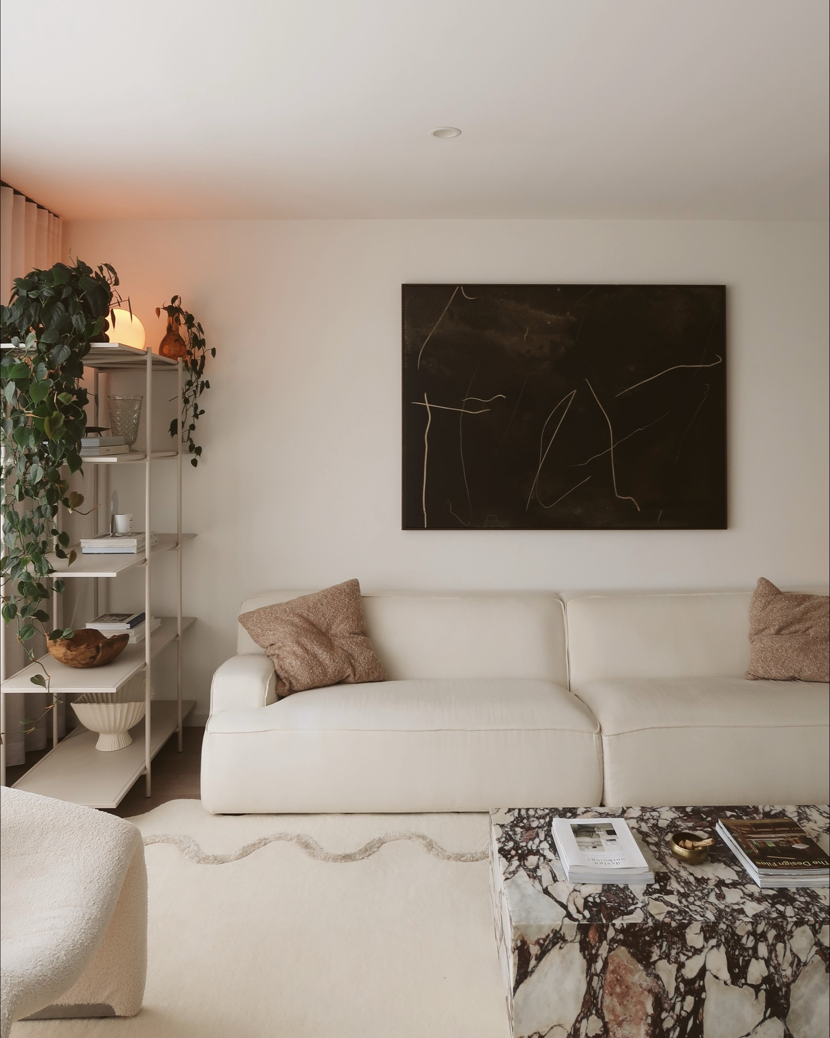 These cushions are the perfect way to add a layer of texture and a subtle pop of color to your space. I’m absolutely loving these Country Road options for my living room – they bring softness and warmth, which is essential when balancing solid elements like furniture or cabinetry.

To create an inviting and elevated coffee table look, consider must-have styling pieces like trays or trivets. They not only add visual interest but also serve as functional landing spots for candles, cups, and other everyday essentials. A simple yet thoughtful touch like this can transform your table into a focal point of form and function. Small details really do make a big impact!

#LTKhome #LTKaustralia #LTKstyletip