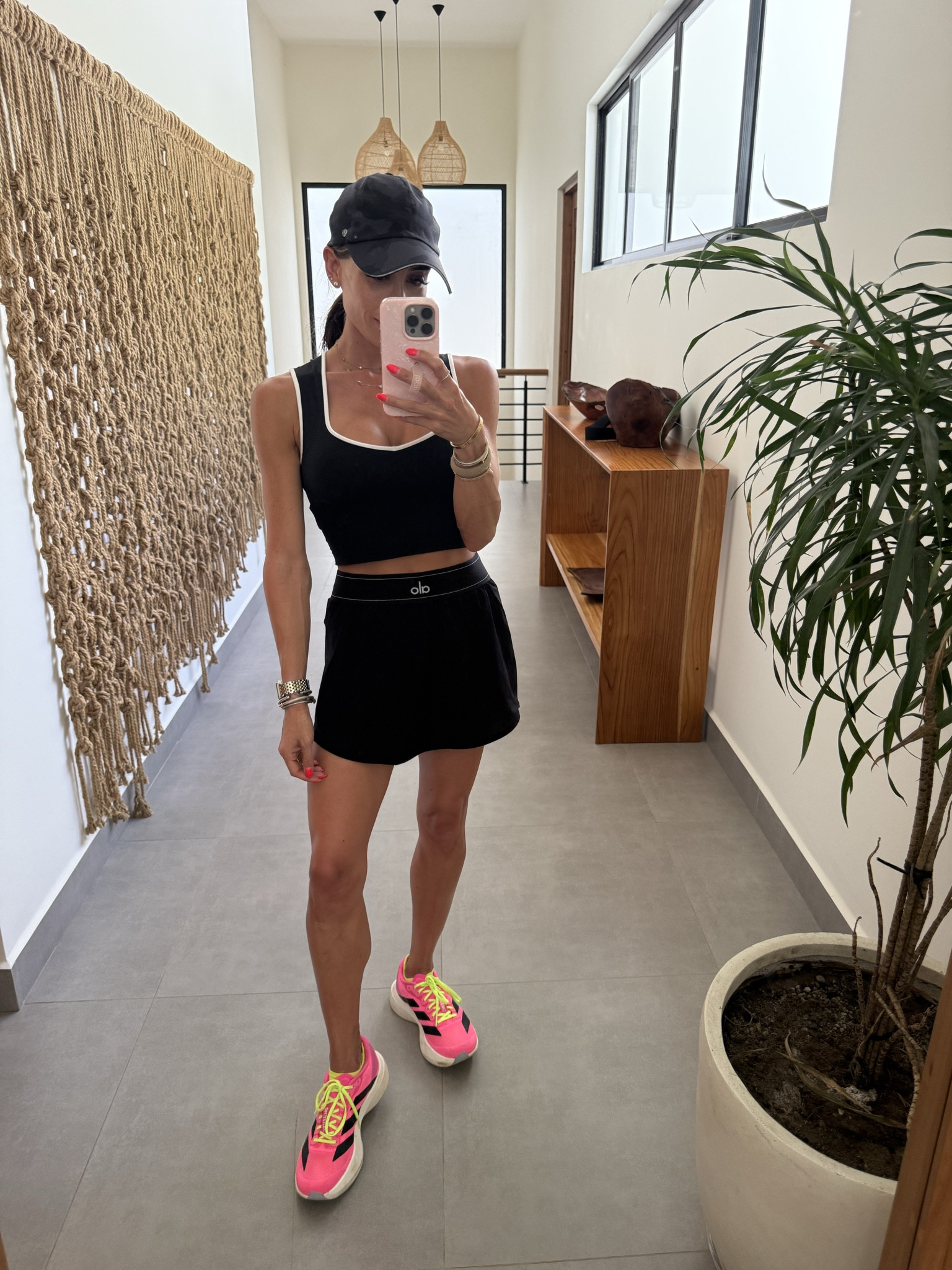 Workout outfit skort with shorts under workout tank with bra on sale sneakers I love for walking on sale 

#LTKSaleAlert