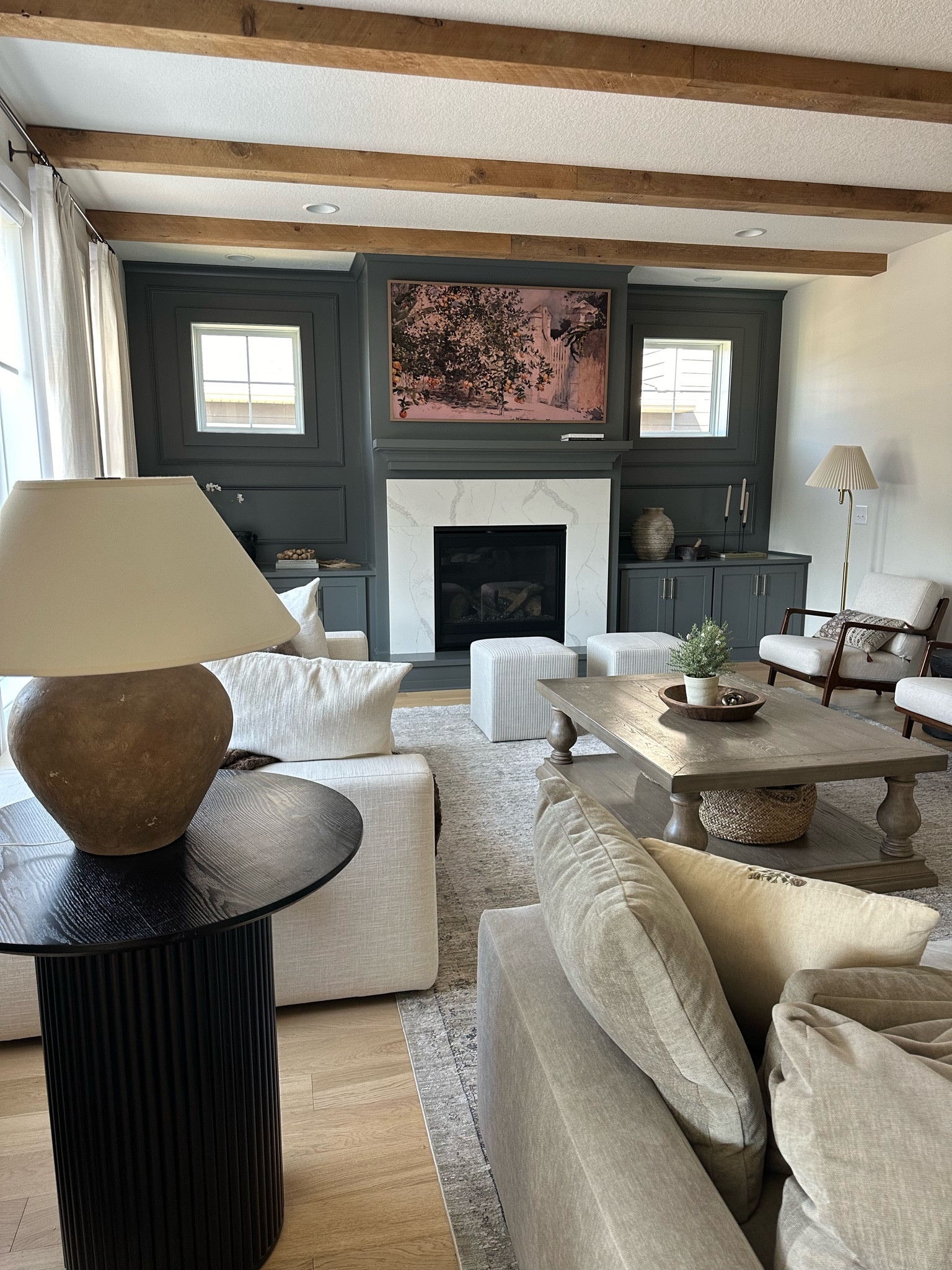 Accent color is SW Grizzle Gray 🩶
Living room sources linked! 

Coffee table / family living room / area rug (doesn’t shed, soft!) / pottery vase / ceramic vases / living room decor / accent table / table lamp 

#LTKHome #LTKFamily #LTKStyleTip