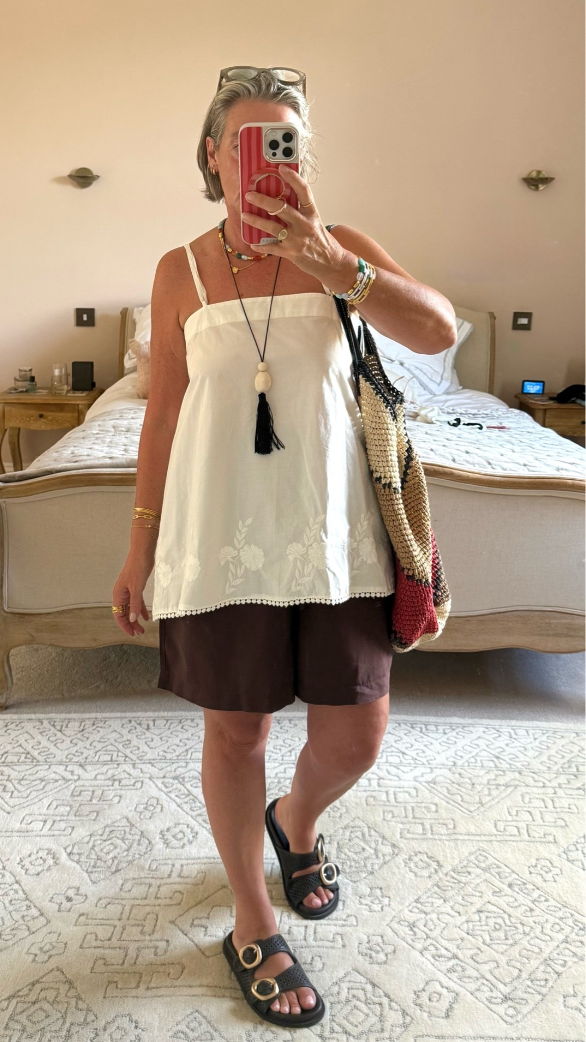 Wearing top in small and shorts size large

#LTKsummer #LTKmidsize #LTKover50style
