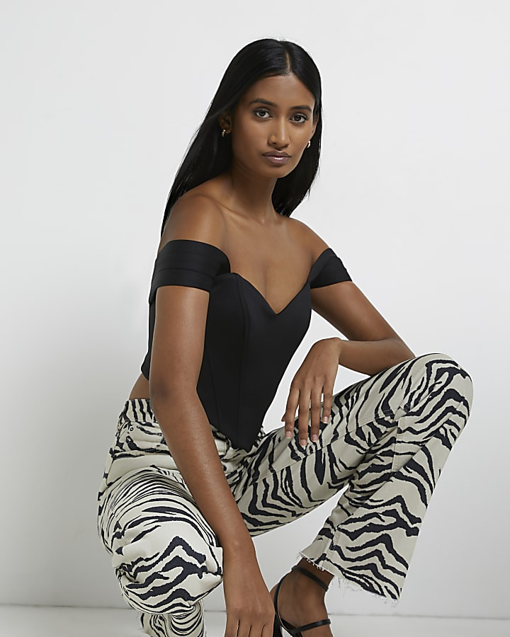 Ecru zebra print high waisted wide leg jeans | River Island (UK & IE)
