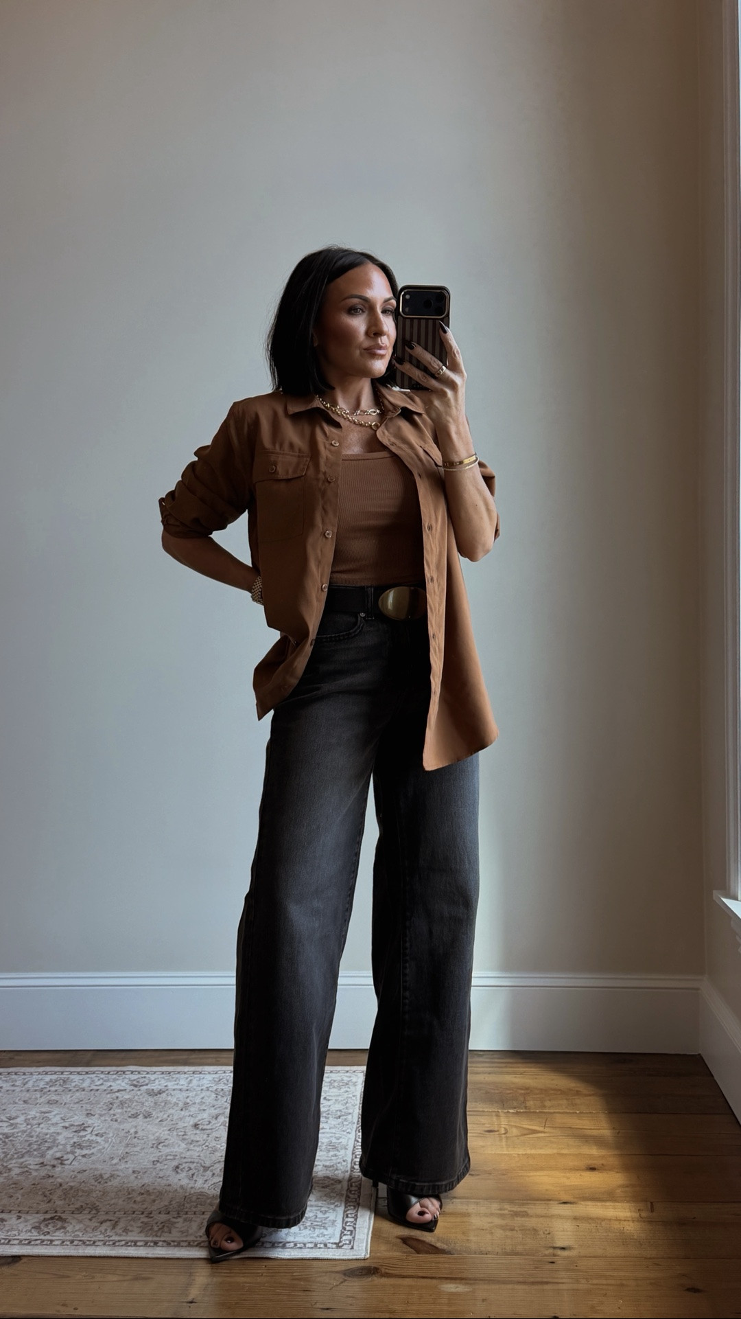 I love that this one has a little more going on than your basic button down. The utility pockets, the warm brown, the longer relaxed fit. I wore it open over a tank here, but there are so many ways I’d style this one.