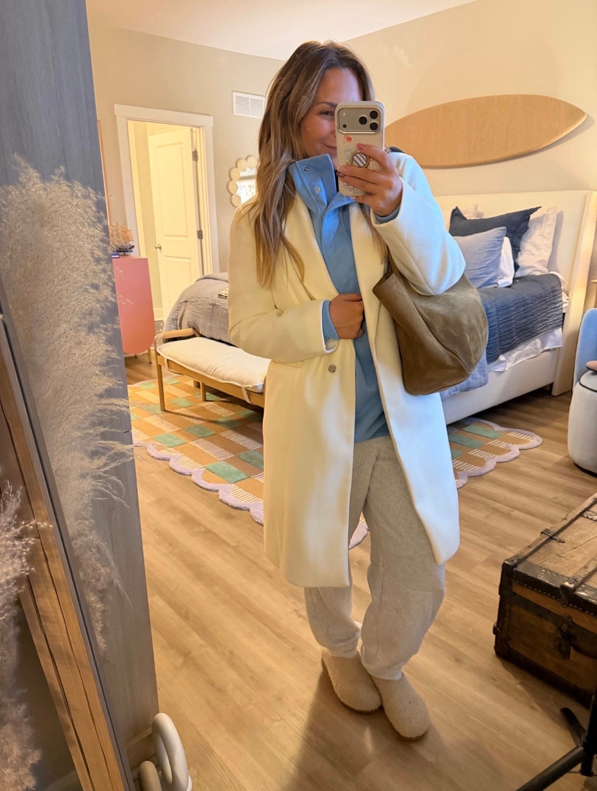Comfy… but make it chic.

I layered a cozy half zip with relaxed joggers and dressed it up with this tailored cream coat for that effortless “put together without trying” look. Add a soft slipper + oversized tote and you’re ready for school drop-off, coffee runs, or a casual day out.

This is my favorite way to make loungewear feel intentional instead of lazy.