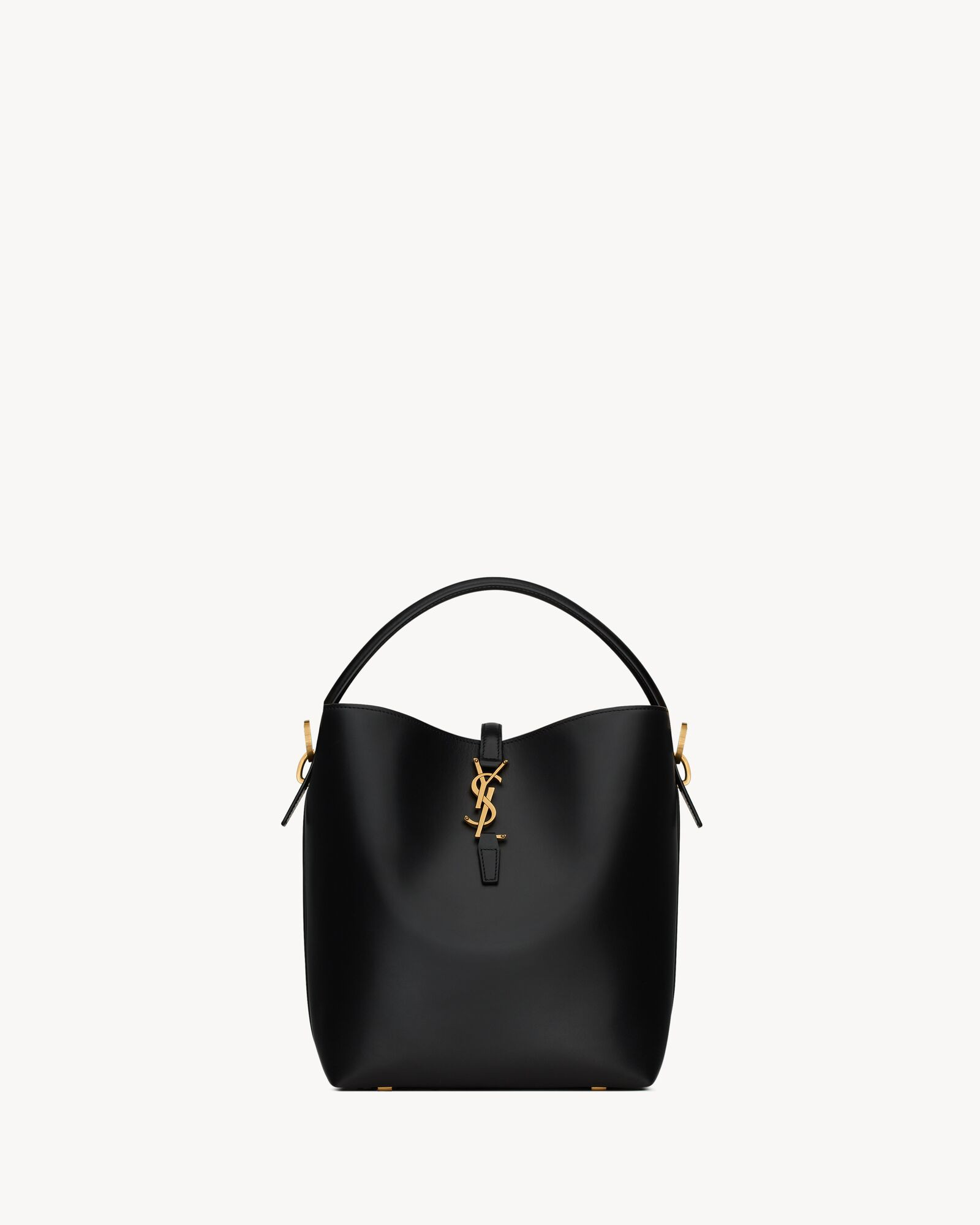 Bucket bag featuring the CASSANDRE hook closure, top handle and an adjustable and detachable shou... | Saint Laurent Inc. (Global)