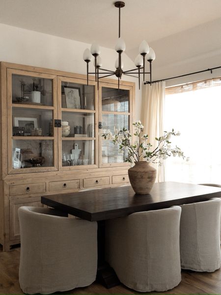 Dining room views // I have been loving the no rug and slipcovered chair combo!

dining room inspo, dining room inspiration, faux stems, upholstered dining chairs, wood dining table, dark wood dining table, dining room, earthy dining room, cabinet, dining cabinet styling, slipcovered dining chair 

#LTKHome #LTKStyleTip