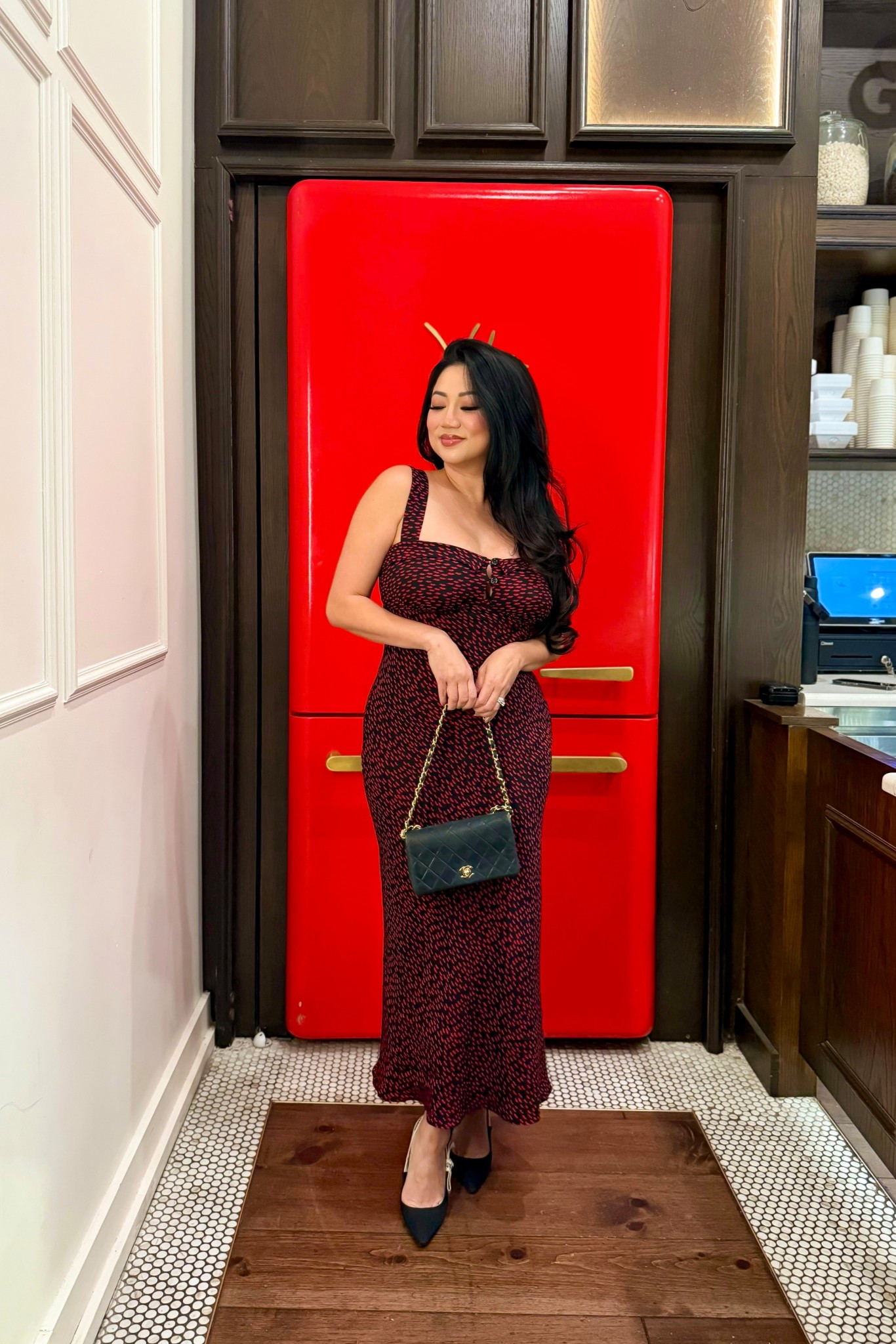 Reformation Tancy Midi Dress // This Reformation midi dress features wide, adjustable straps and dainty bust cup detailing in a red and black print. I’m wearing sz 6. 

#LTKHoliday #LTKgrwm #LTKOver40