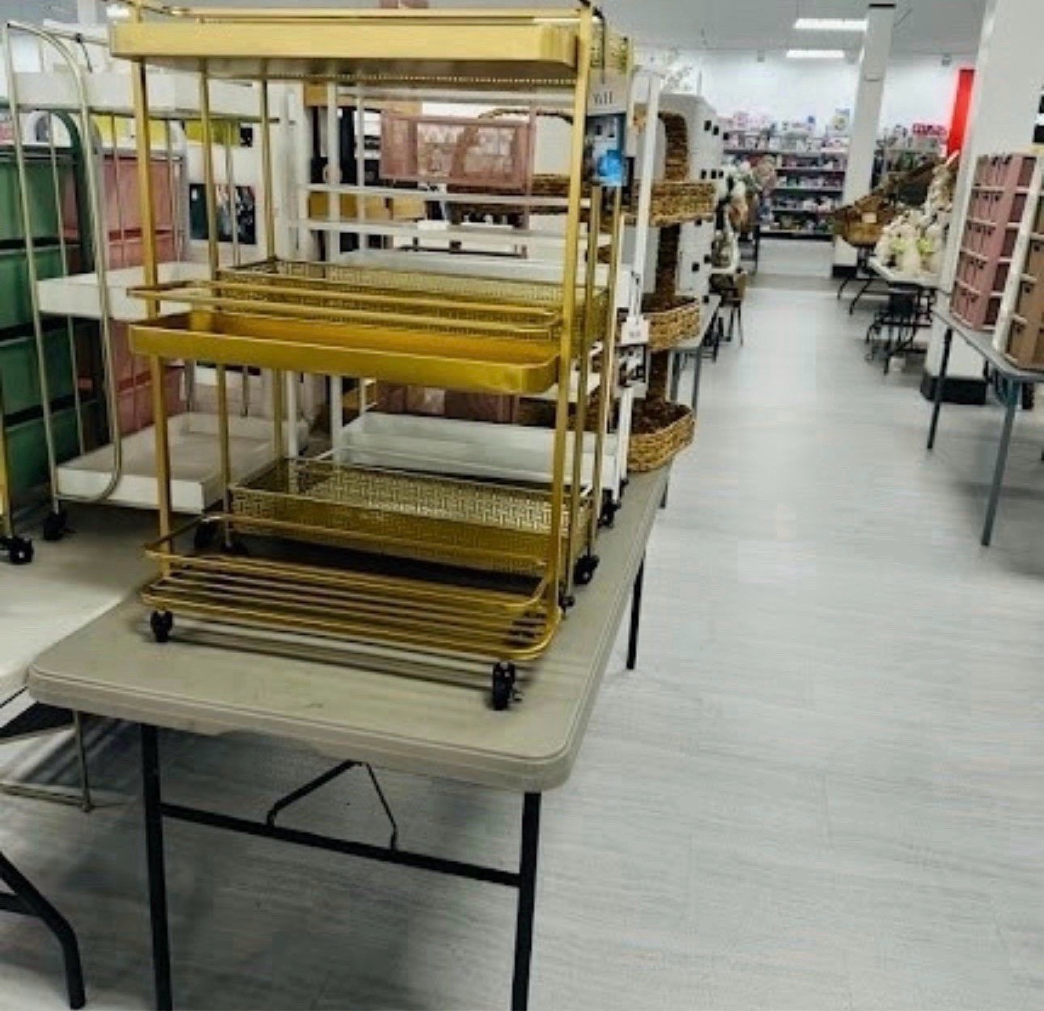 Organized but make it glam! This gold tiered rolling cart is a total chameleon—use it as a chic bar cart for your next party, a coffee station, or even extra storage in your office or bathroom. The geometric metal detailing is so unique! Truly a "run, don't walk" find

#LTKHome