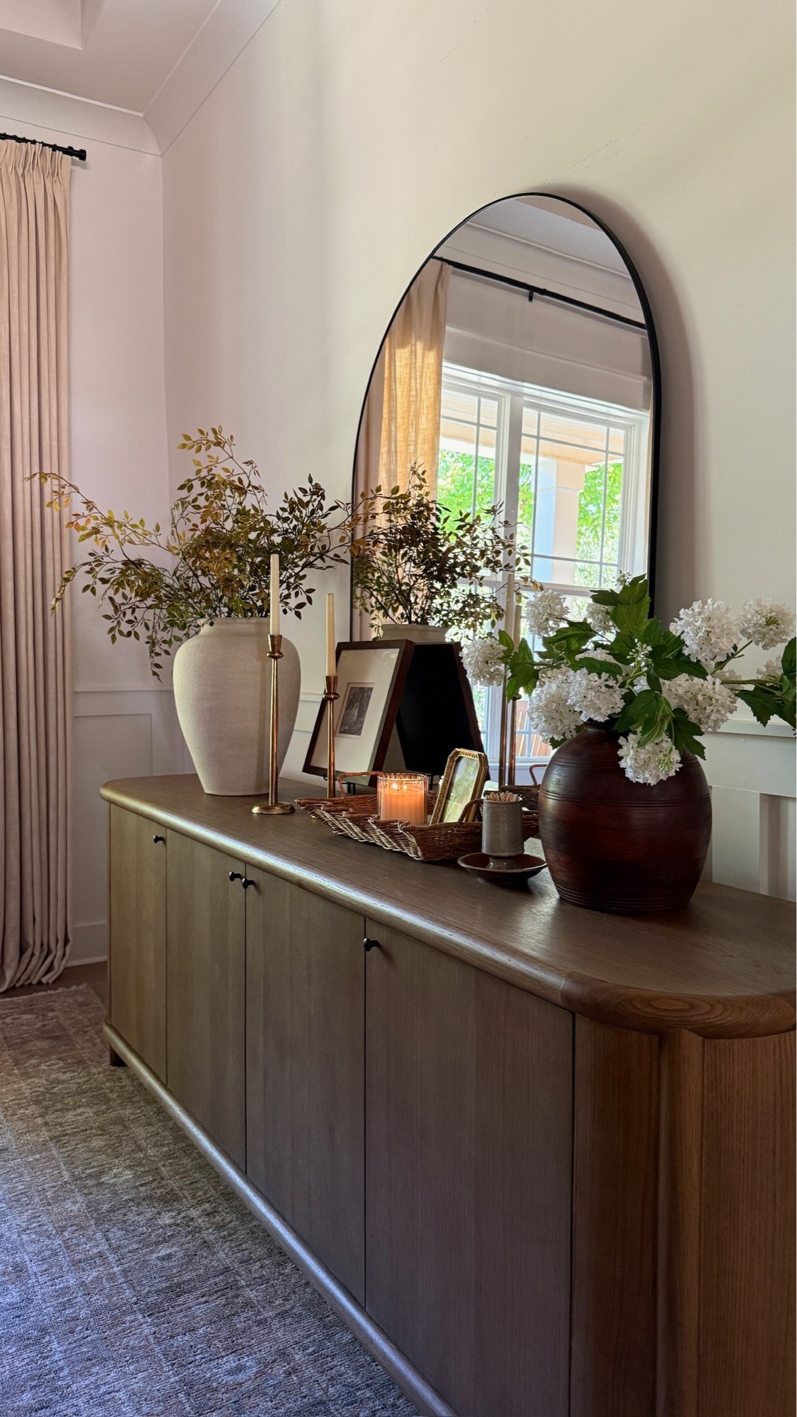 The new sideboard buffet table in our dining room is such a follower favorite — and I’m so glad. I love styling it with a variety of faux stems, this pretty arch mirror, and of course a few little other decorative objects. It’s cozy and perfectly elevated. 🍂

#LTKSeasonal #LTKHome