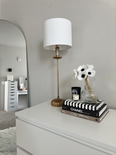 My brass table lamp is on sale for 20% off with code “friendsfamily” / linking my fashion and interior design books, metal arch mirror (on sale), candle, ribbed glass vase, wall scones and LED vanity mirror / neutral room decor 

#LTKsalealert #LTKhome #LTKfindsunder100